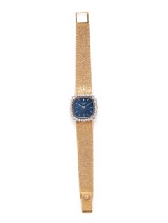 Vintage Patek Philippe in 18K Yellow Gold with Diamond Bezel Wristwatch