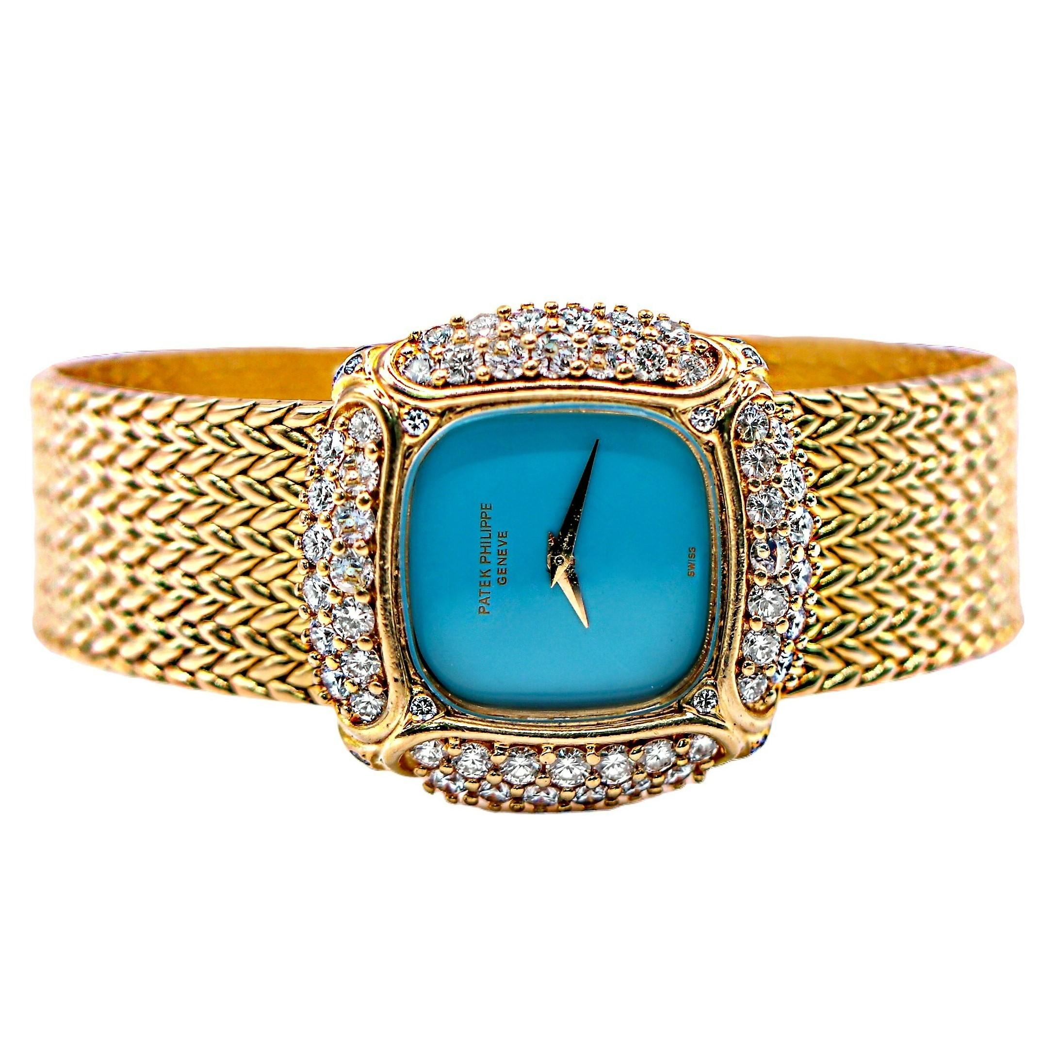 One of the world's most highly esteemed houses, Patek Philippe, created this luxurious timepiece at some  time in the late 20th century. With it's sky blue turquoise dial surrounded by a heavily diamond encrusted cushion shaped bezel and with a