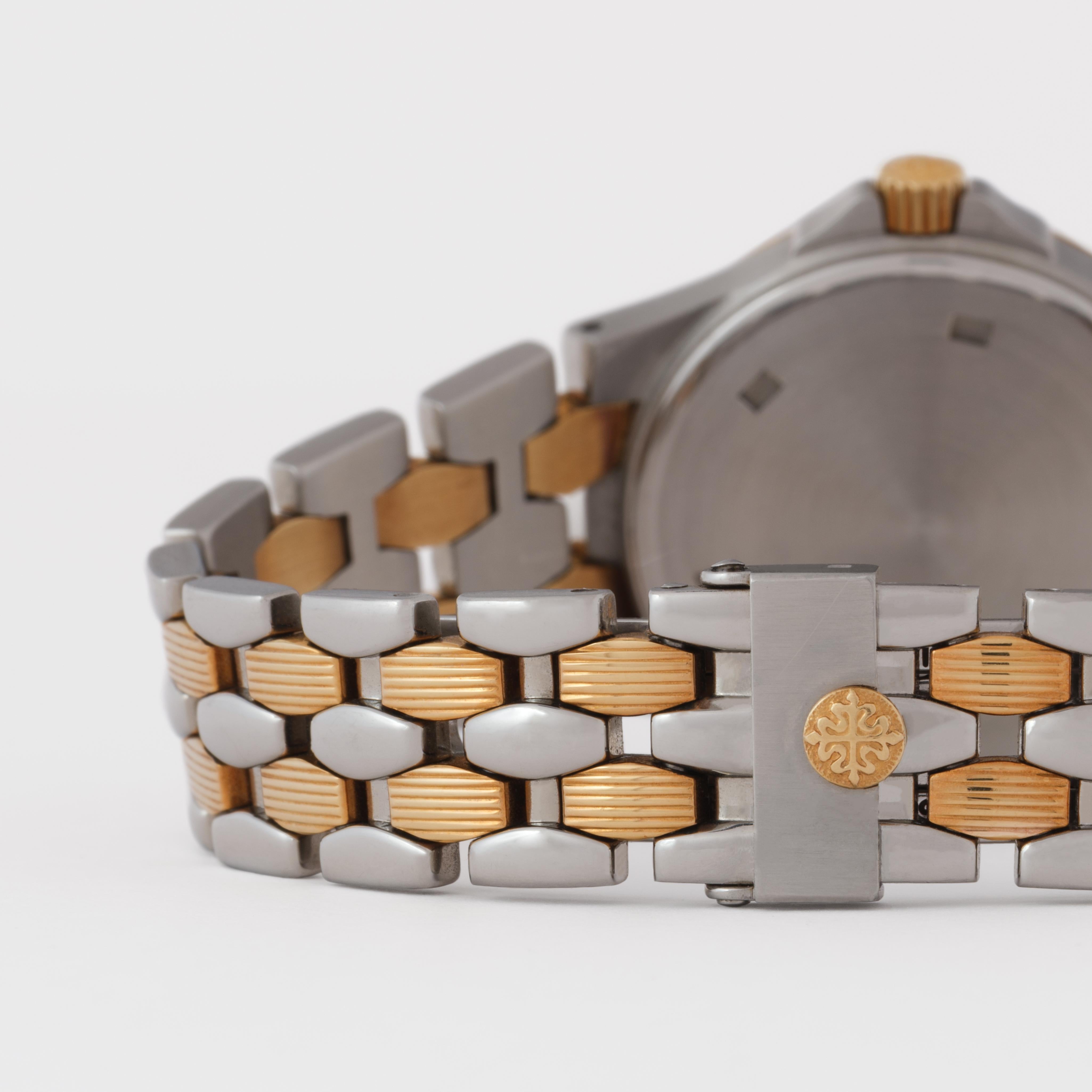 Patek Philippe Neptune Model 4880/1JA d'epoca in acciaio inossidabile e 18 carati in vendita 1