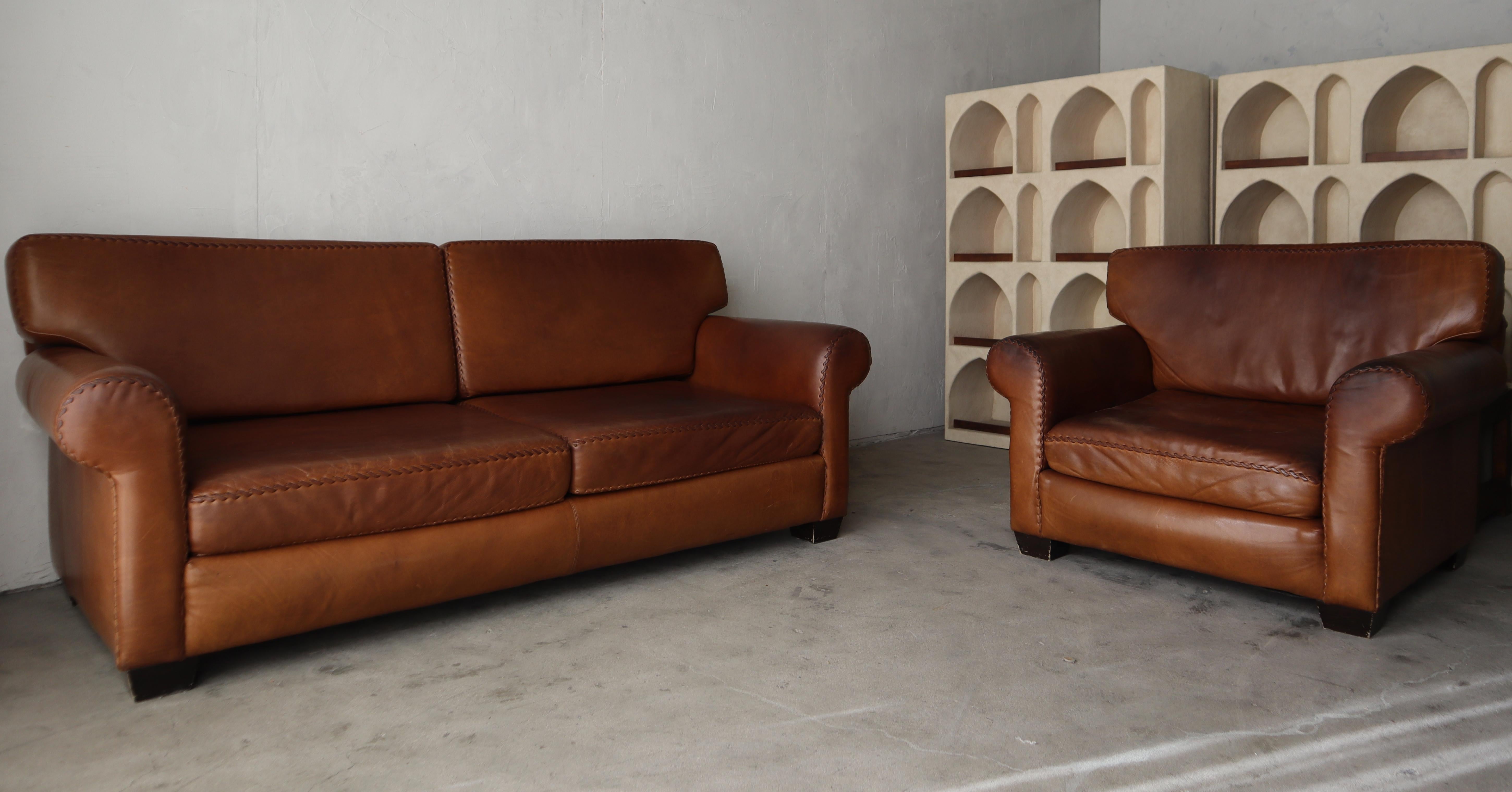 20th Century Vintage Patinated Leather Baseball Stich Lounge Chair and Ottoman For Sale
