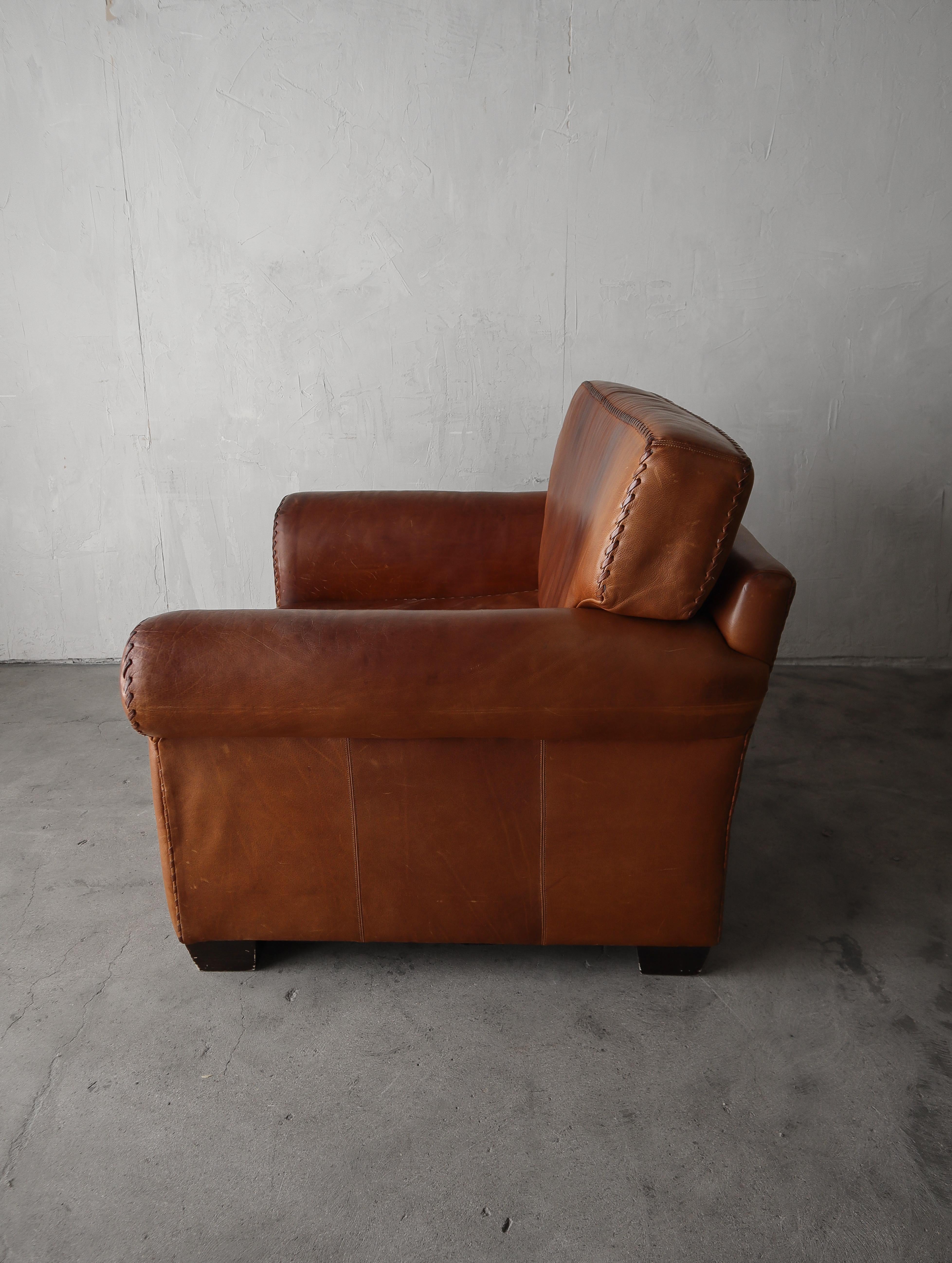 Vintage Patinated Leather Baseball Stich Lounge Chair and Ottoman For Sale 3