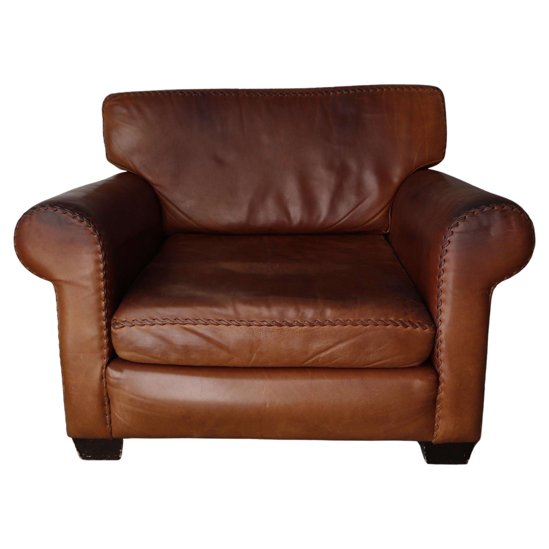 Vintage Patinated Leather Baseball Stich Lounge Chair and Ottoman For Sale