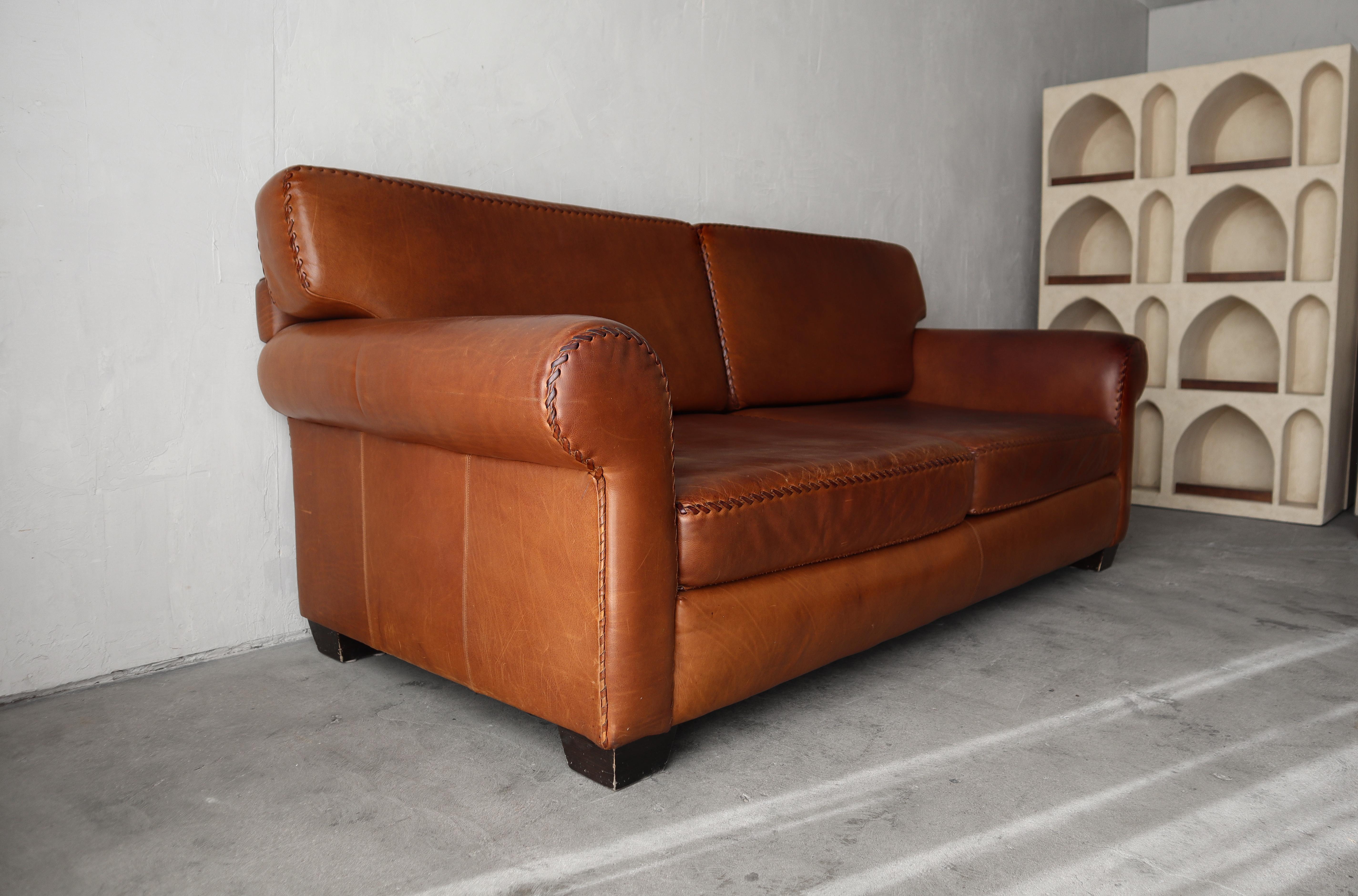 Minimalist Vintage Patinated Leather Baseball Stich Sofa For Sale
