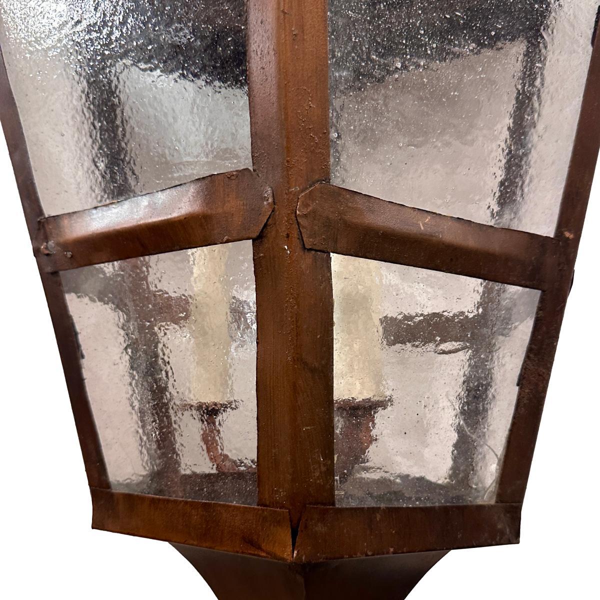A circa 1960's Italian patinated tole metal lantern.

Measurements: 
Minimum drop: 37