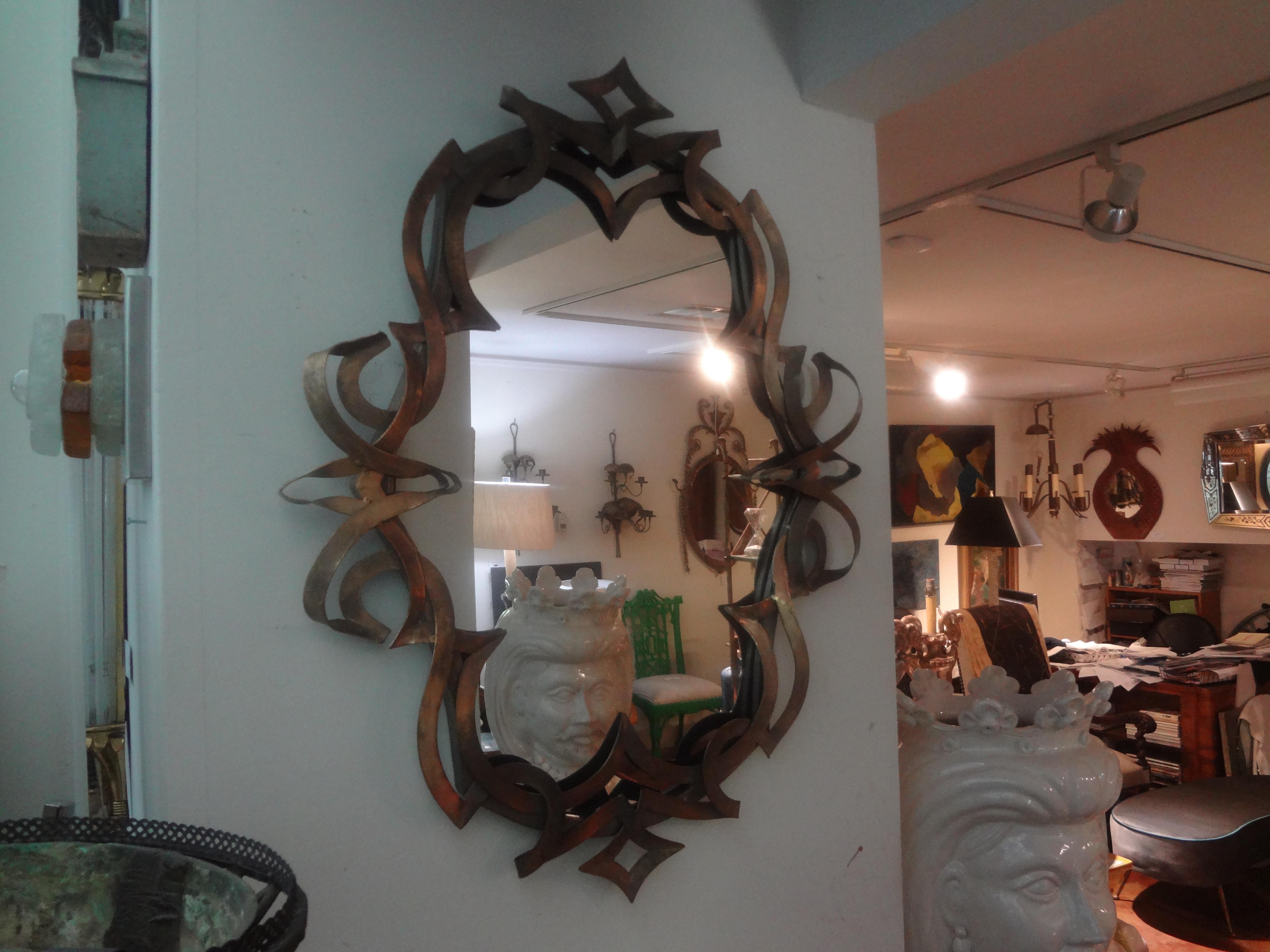 20th Century Vintage Patinated Metal Ribbon Mirror For Sale