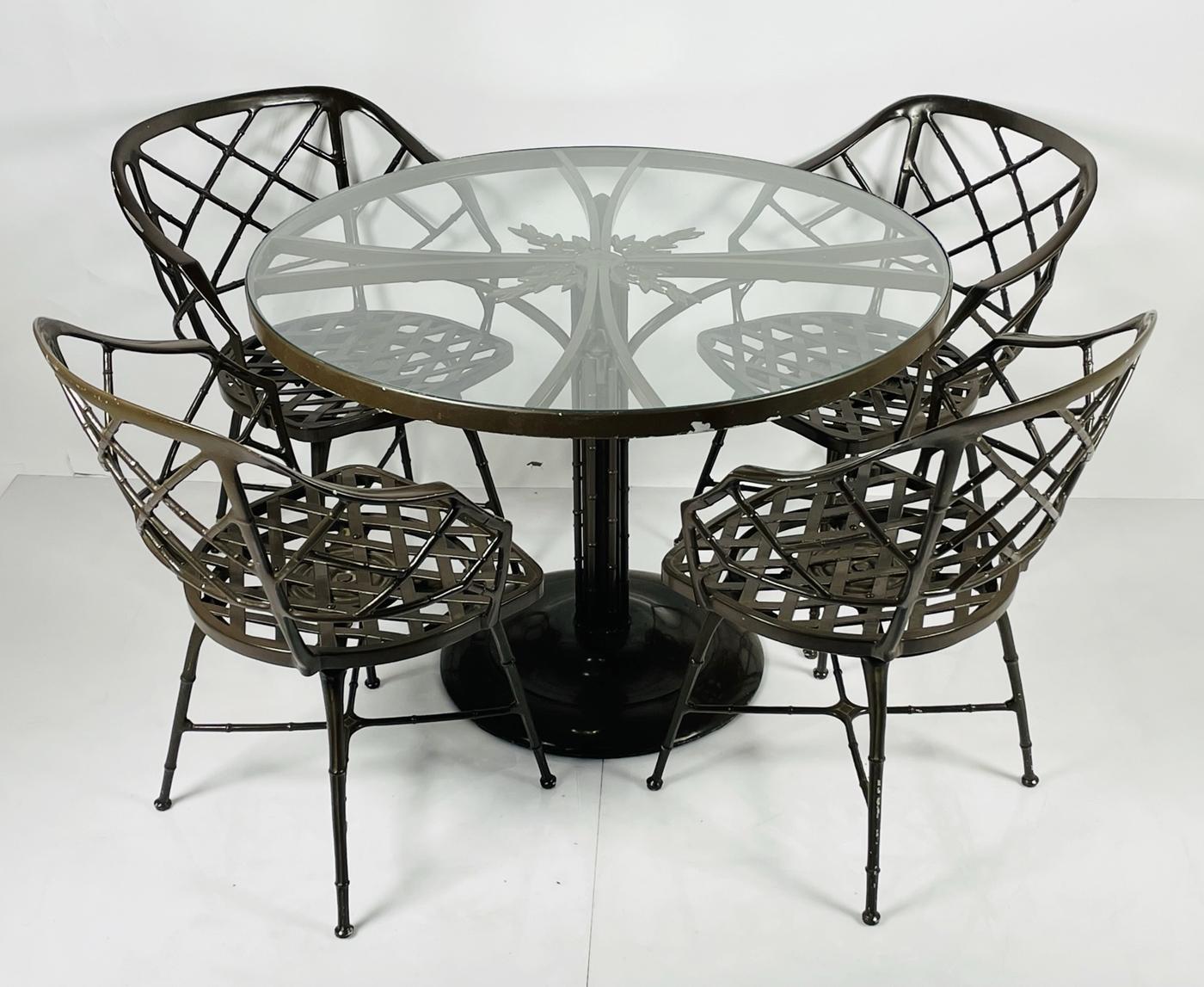 A fabulous table and four coordinating chairs. Made by the iconic Brown Jordan. Part of their Classic ll series. 

The table retains the original label, the chairs come with a cloth seat pad.

Measurements:
Table:
41 3/8 inches diameter x 29