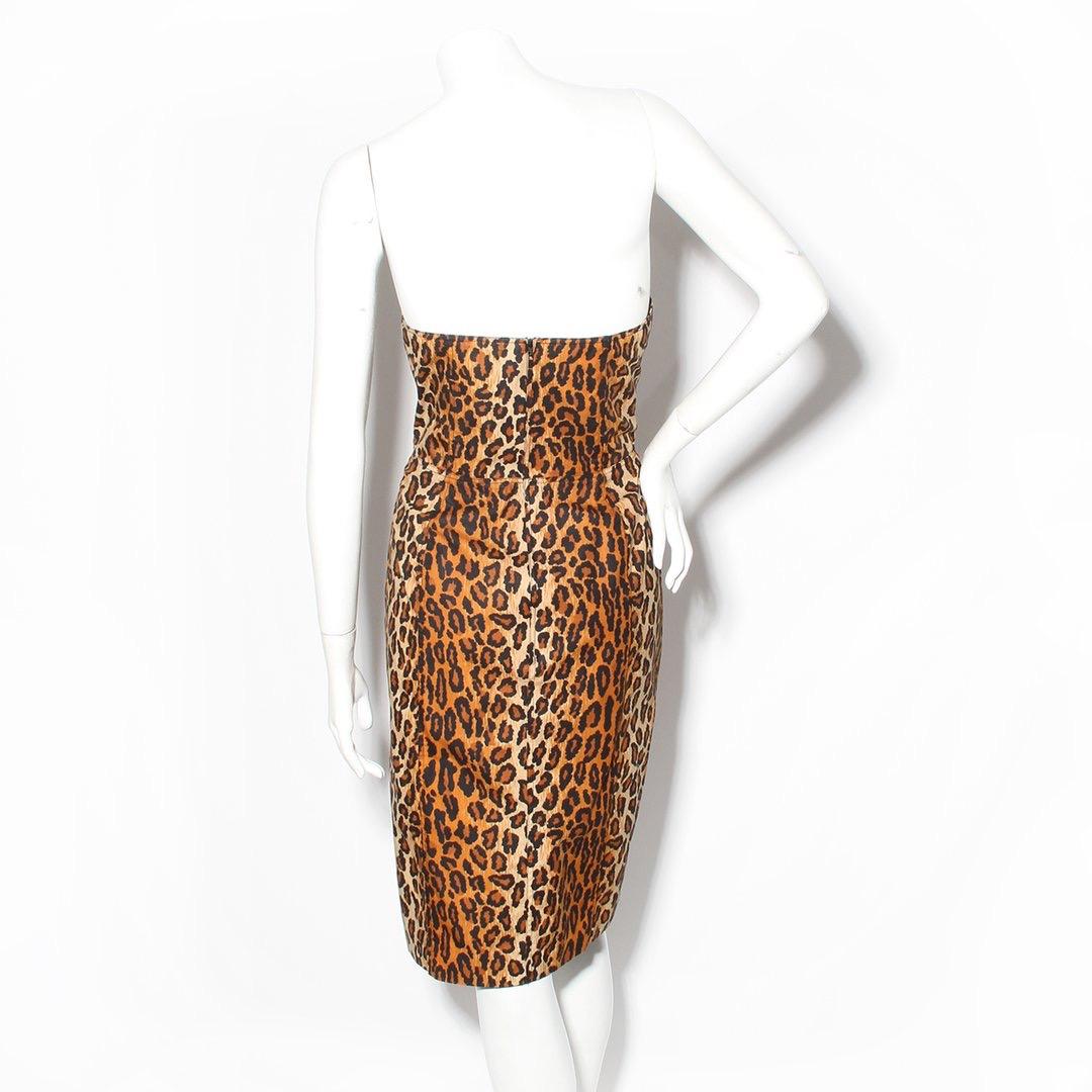 Product Details:
Leopard dress by Patrick Kelly
Spring/summer 1989
Leopard print
Strapless 
Sweetheart neckline 
Pointed waistline 
Boning in waist 
Laceup front 
Back zip closure
Condition: Excellent vintage condition, little to no visible wear.