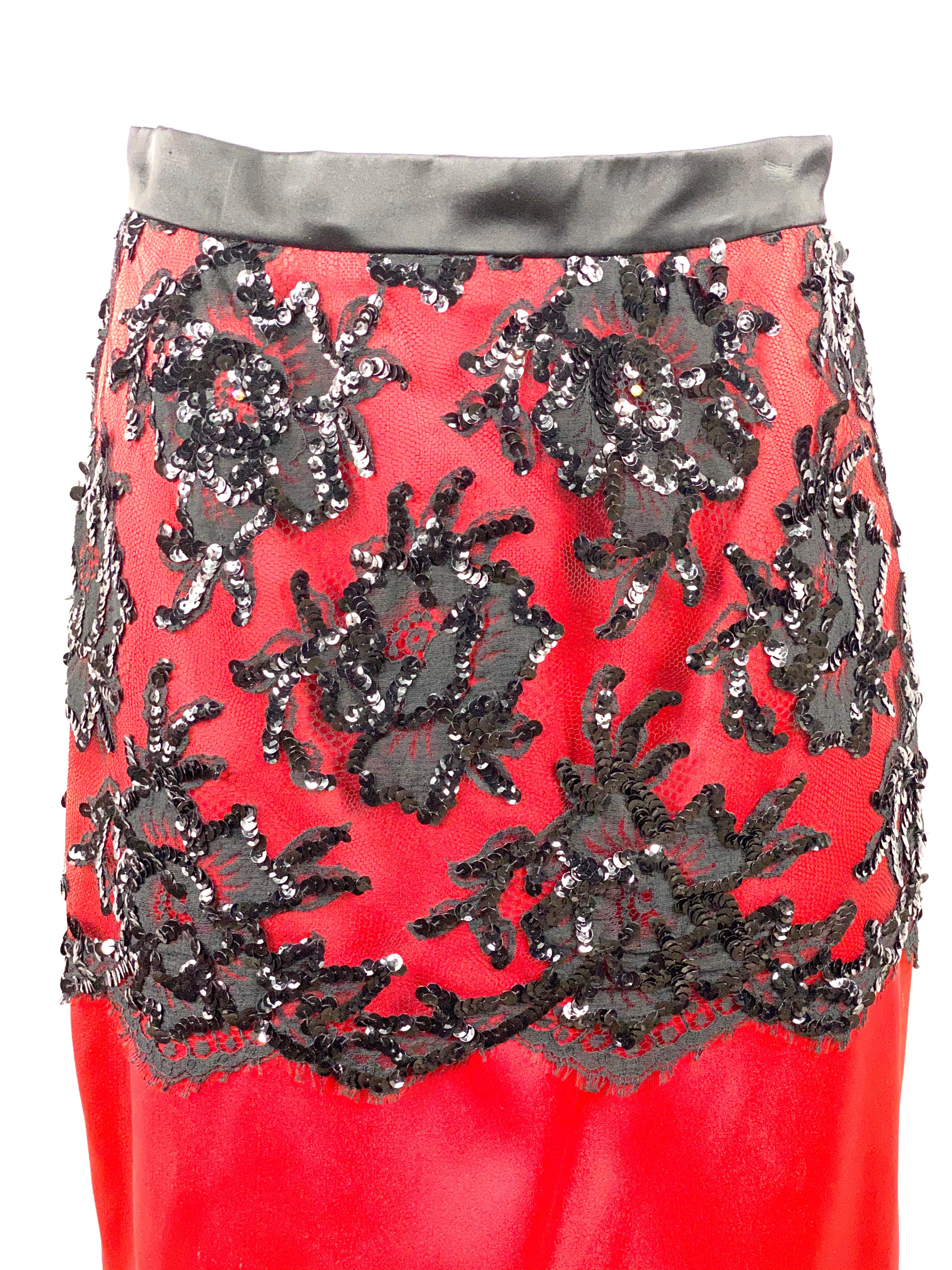 Vintage PATRICK KLLY Red and Black Evening Pencil Skirt Size 42

Product details:
Size 42
Red pencil skirt 
Featuring mesh, sequin floral detail
The mesh detail drops 14.25” down 
Rear zip and button closure
Made in France 
