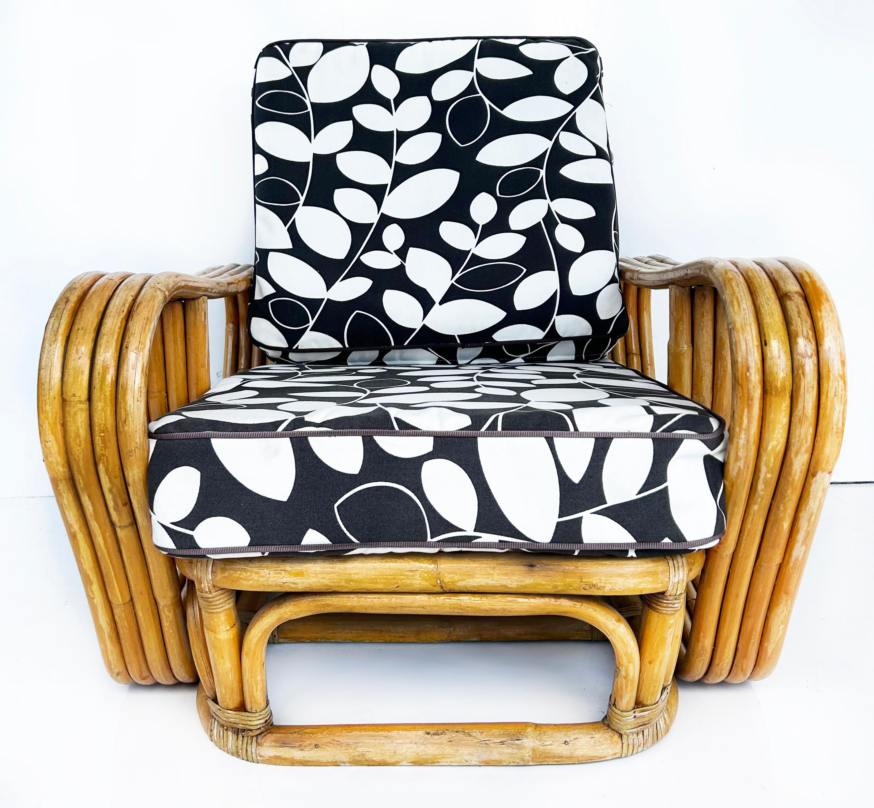 Vintage Paul Frankl Style Bent 4-Strand Rattan Club Chair mit New  Kissen

Zum Verkauf angeboten wird ein viersträngiger Rattan-Clubsessel im Stil von Paul Frankl.  Die losen Sitzkissen sind neu gepolstert und passen zu einigen anderen ähnlichen