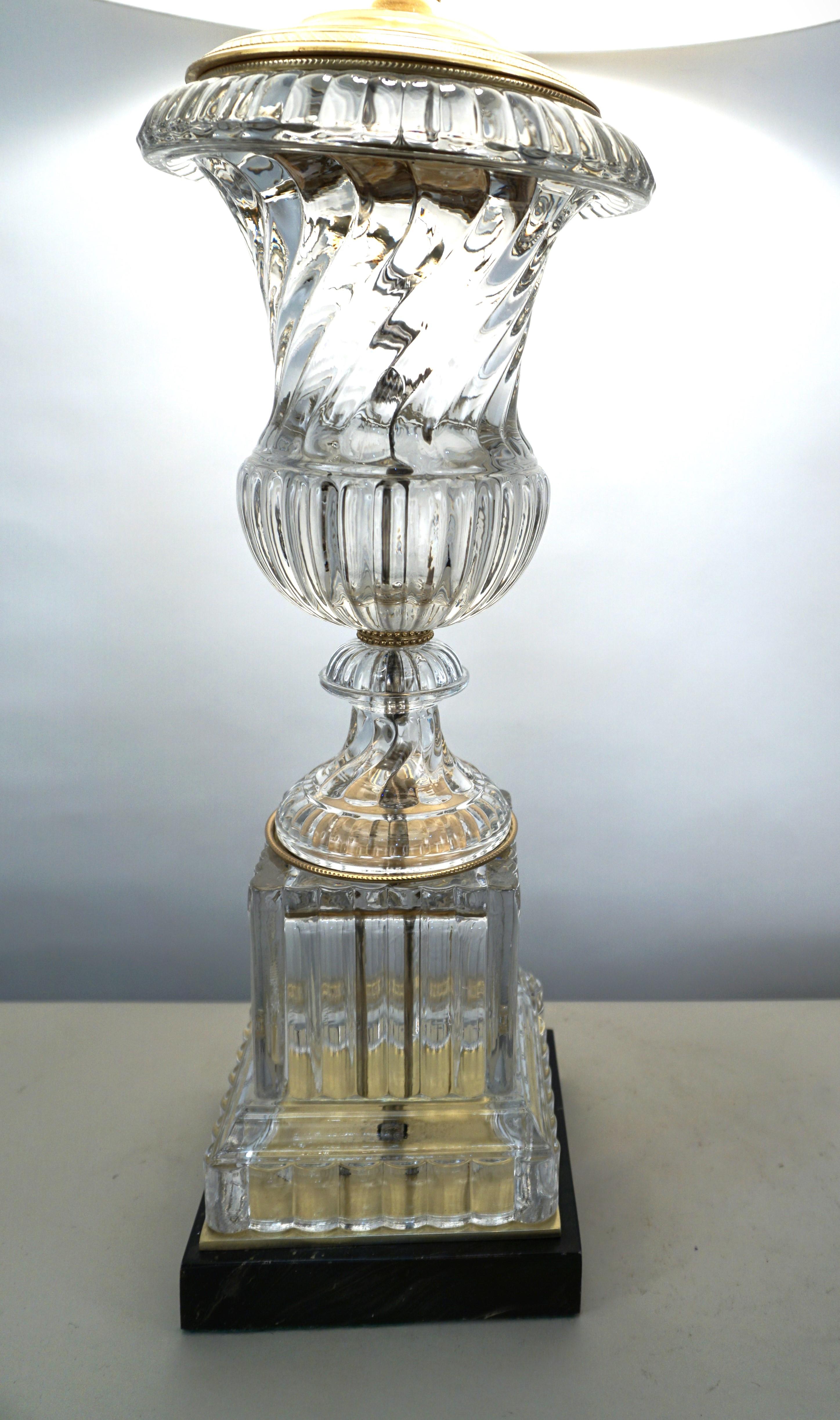 Classic style heavy glass urn with brass hardware and faux marble finish base table lamp.
This lamp has been rewired and fitted with silk hardback lampshade.