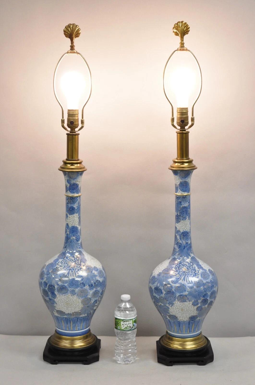 Vintage Paul Hanson Chinoiserie Blue Poreclain Flower Oriental Table Lamp Pair on Wooden Base. Circa Early 20th Century. Measurements: 39
