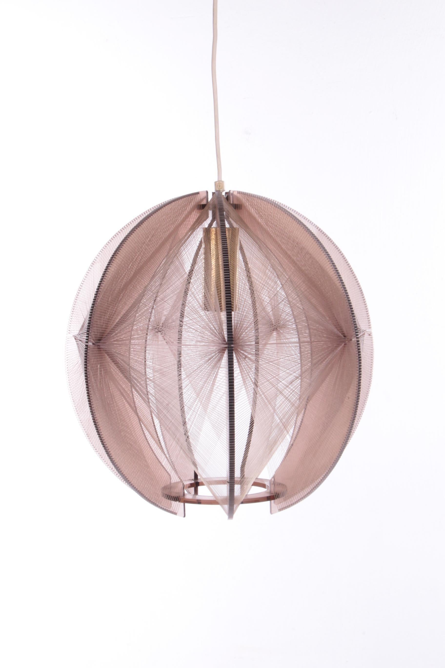 Vintage Paul Secon Spider Web Hanging Lamp, 1960, Germany.


A beautiful ceiling lamp from the 1960s, designed for Sompex by the French designer Paul Secon. Made in Germany

The lamp has a smoked glass colored Plexiglas frame with threaded nylon