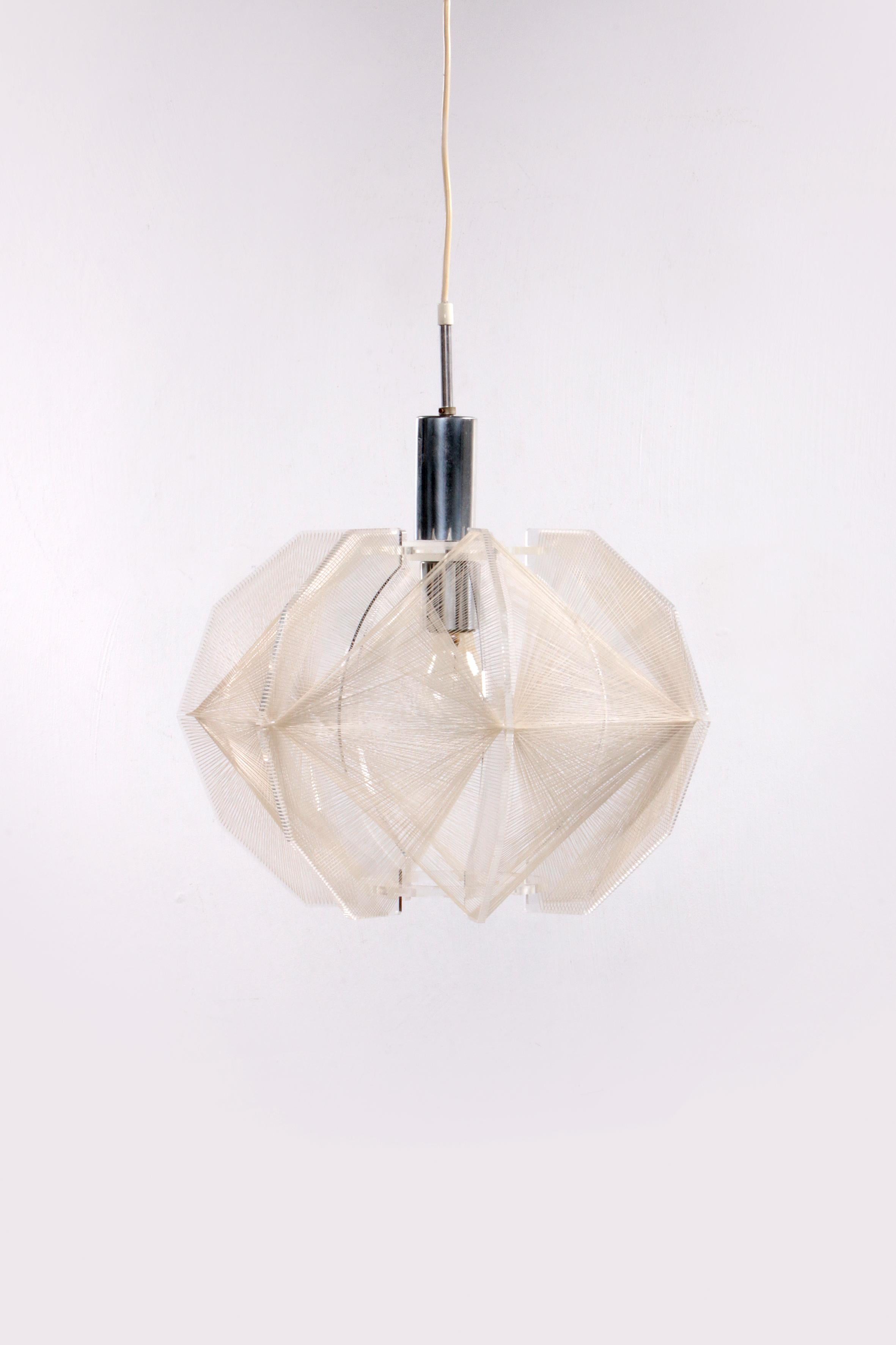 Vintage Paul Secon Spider web hanging lamp, 1960 germany


A beautiful ceiling lamp from the 1960s, designed for Sompex by the French designer Paul Secon. Made in Germany.

This lamp is also called spider lamp. Material: perspex lamp in
