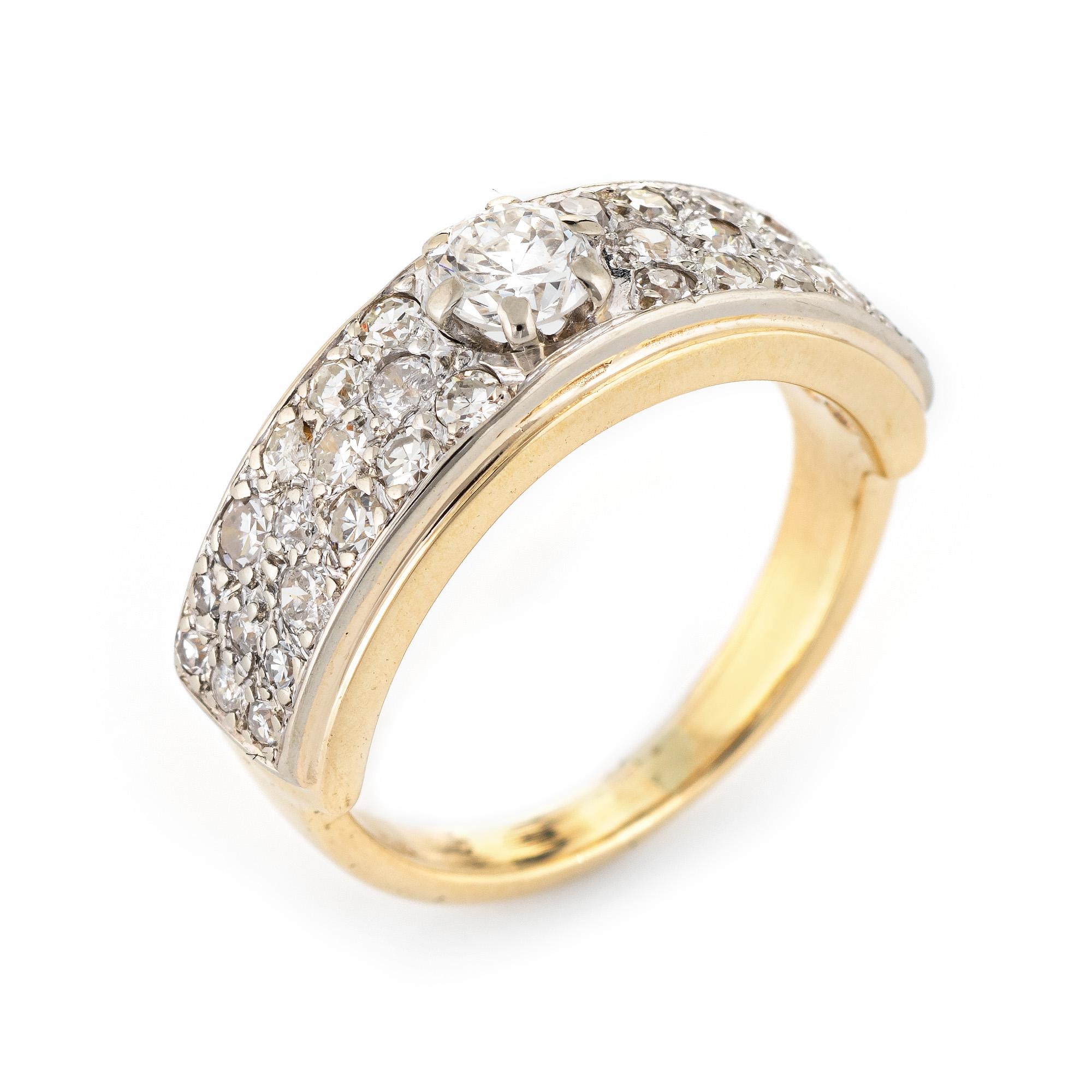 Stylish vintage diamond band (circa 1940s to 1950s) crafted in 14 karat yellow gold. 

Centrally mounted old European cut diamond is estimated at 0.36 carats, accented with 32 estimated 0.02 carat single cut diamonds. The total diamond weight is