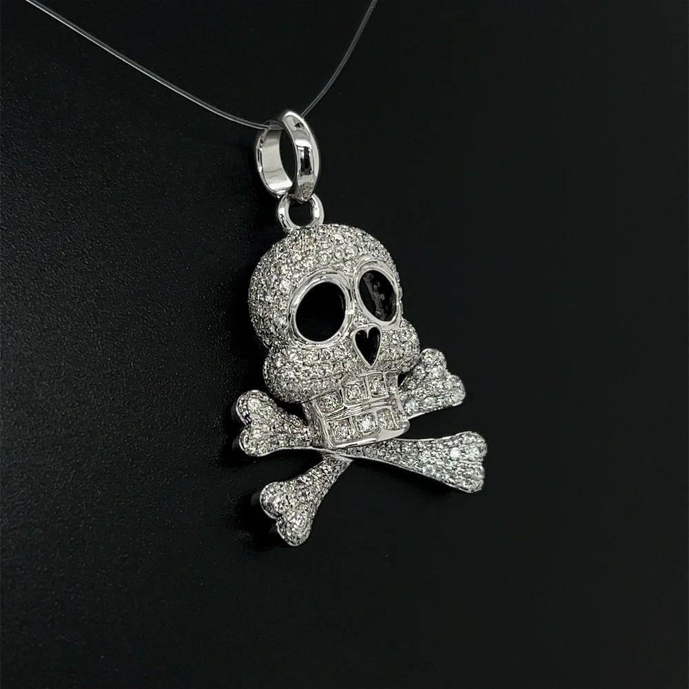 Vintage Pave Diamond Skull and Cross Bones Gold Pendant Necklace Simply Fabulous! Highly detailed Custom Pendant featuring Pave Diamond Skull and Cross Bones (1.65tcw). Hand crafted in 18K White Gold. More Beautiful in Real time! Sure to be