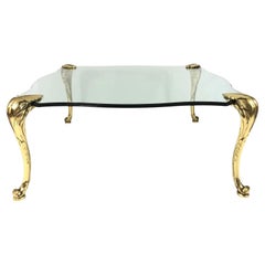 Vintage P & A. Tavolino Guerin in ottone e vetro con gambe a fronda