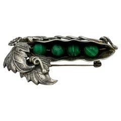 Broche vintage de plata con guisantes de malaquita