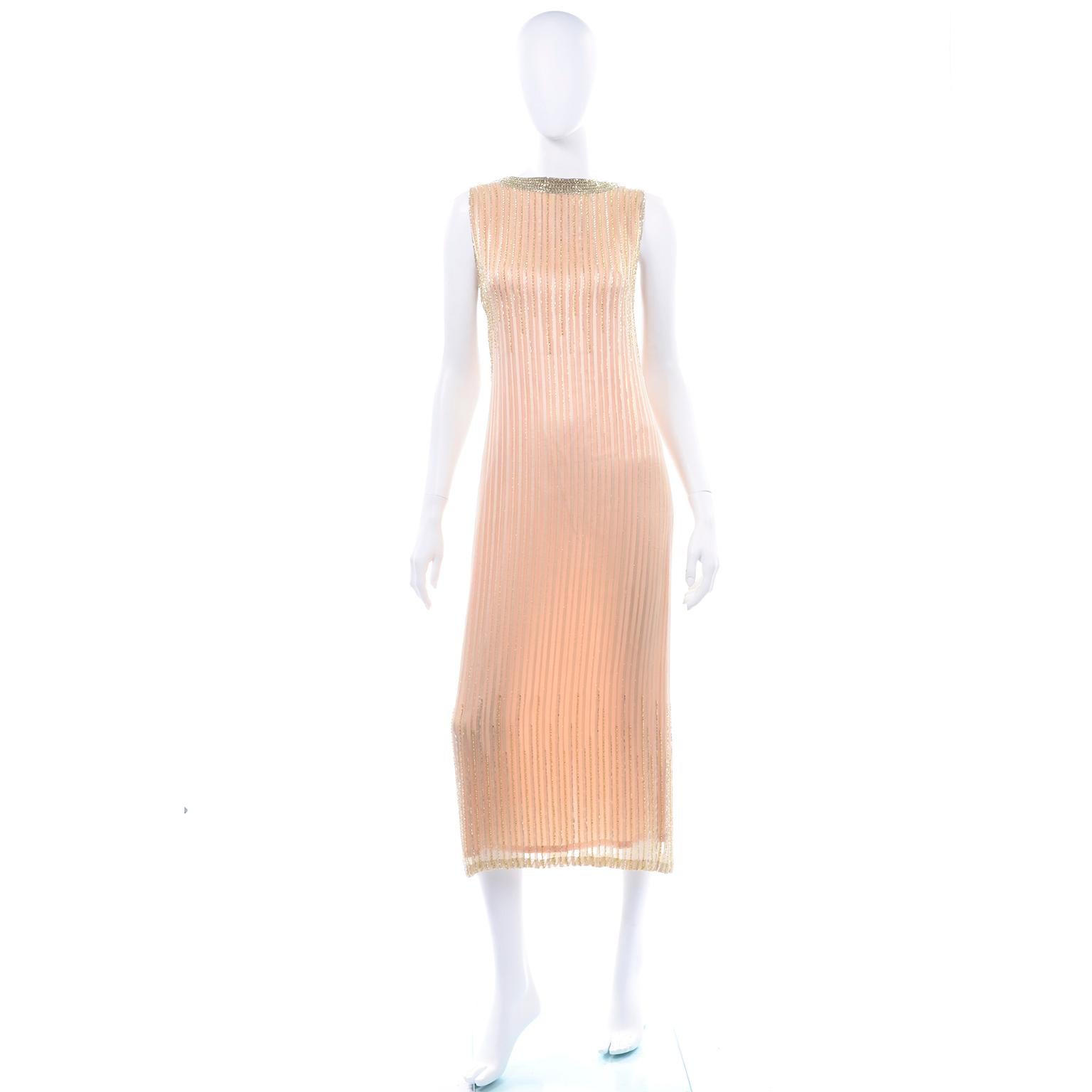 This is an absolutely exquisite vintage peach and gold beaded sleeveless evening dress. This stunning vintage dress was purchased at the high end Claire Dratch boutique in Washington, DC in the 1990's. This dress has beautiful beadwork all along the