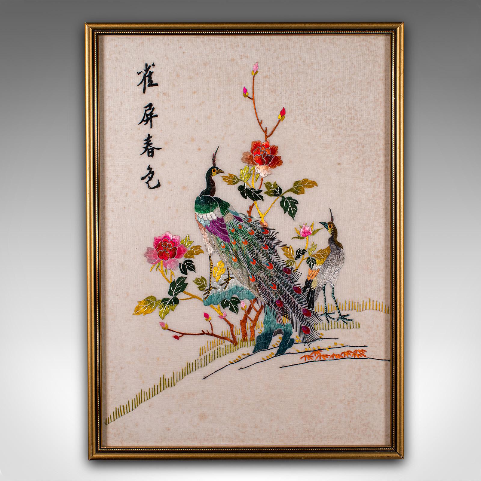 
This is a vintage peacock display panel. A Korean, framed silk cotton embroidery scene, dating to the Art Deco period, circa 1930.

Colourful decorative scene with peacock interest
Displays a desirable aged patina throughout
Silk cotton skilfully