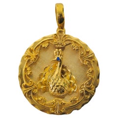 Vintage Peacock Motif Pendant with Blue Sapphire in 14k Gold 