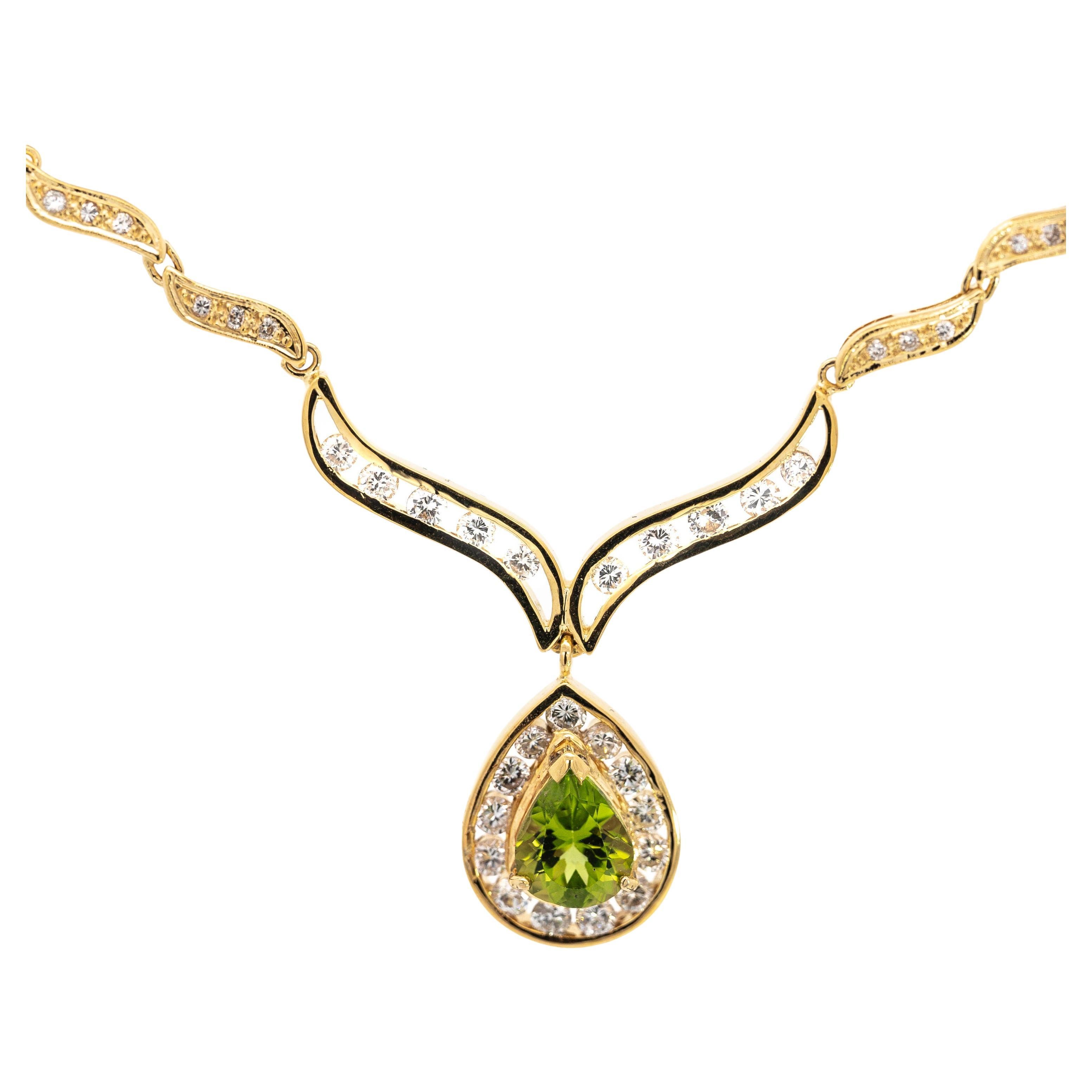 Vintage Pear Cut Green Peridot Drop Pendant Necklace with Diamonds in 18K Gold For Sale