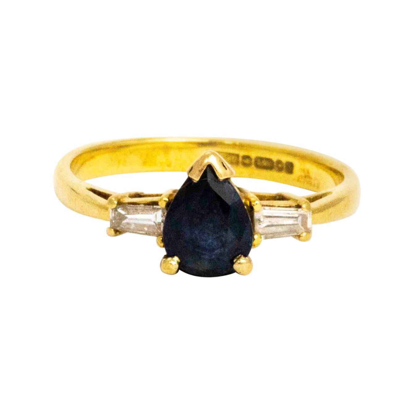 Vintage Pear Cut Sapphire and Baguette Diamond Three-Stone Ring