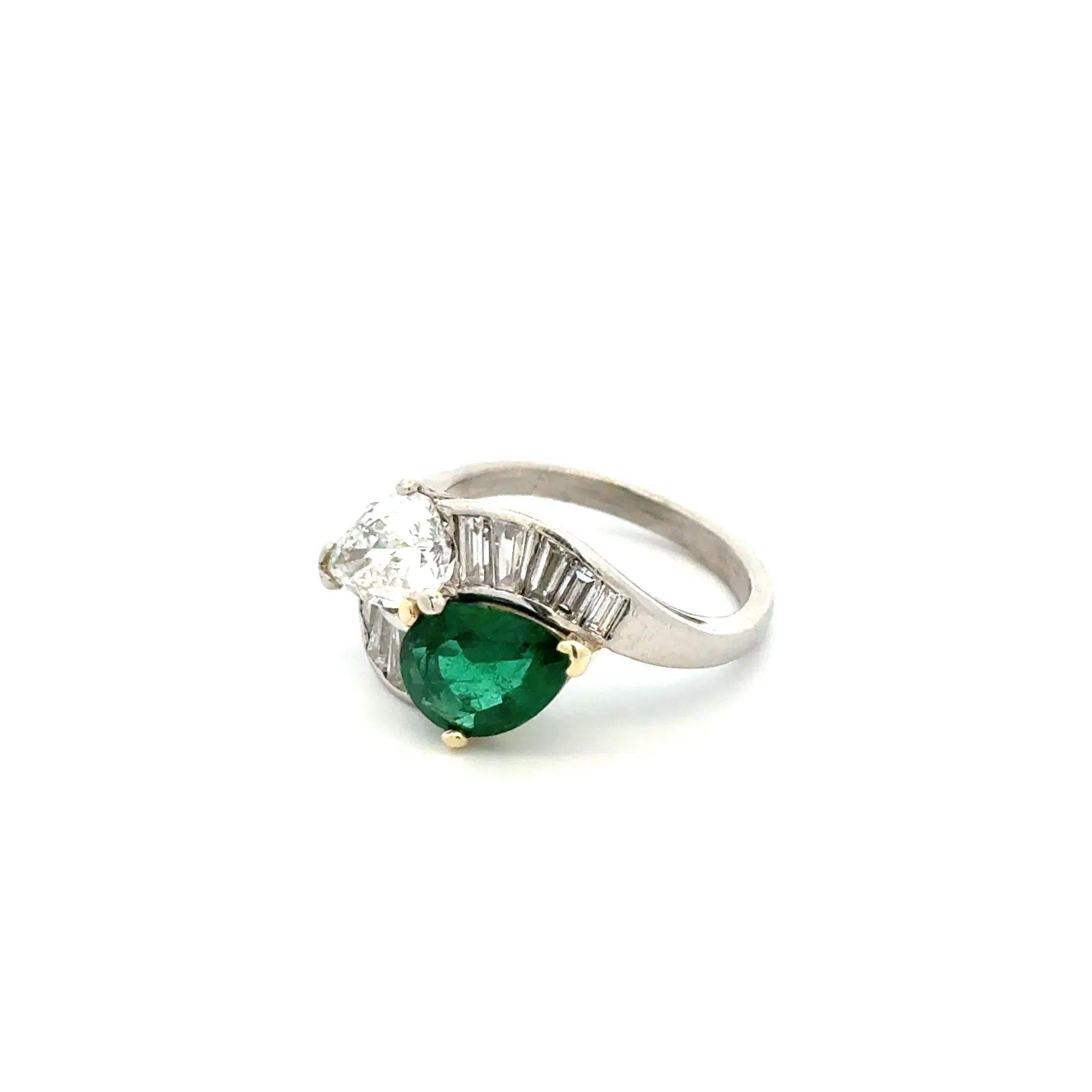 Mixed Cut Vintage Pear Diamond, Emerald and Baguette Diamond Platinum Bypass Ring For Sale