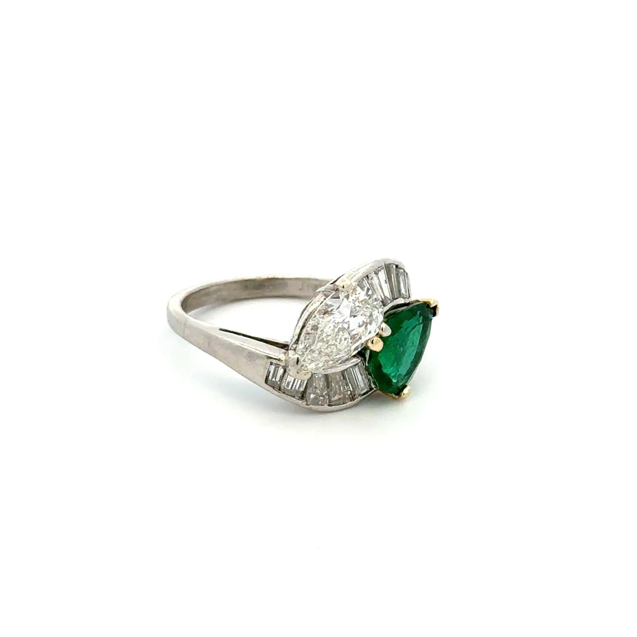 Women's Vintage Pear Diamond, Emerald and Baguette Diamond Platinum Bypass Ring For Sale