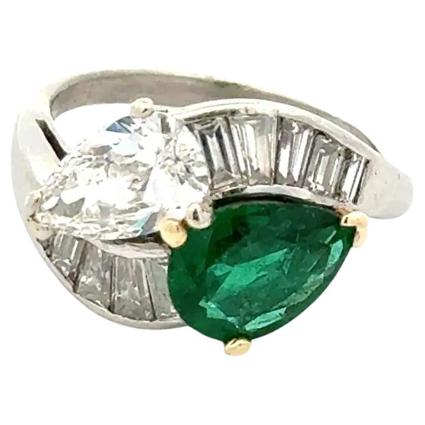 Vintage Pear Diamond, Emerald and Baguette Diamond Platinum Bypass Ring For Sale
