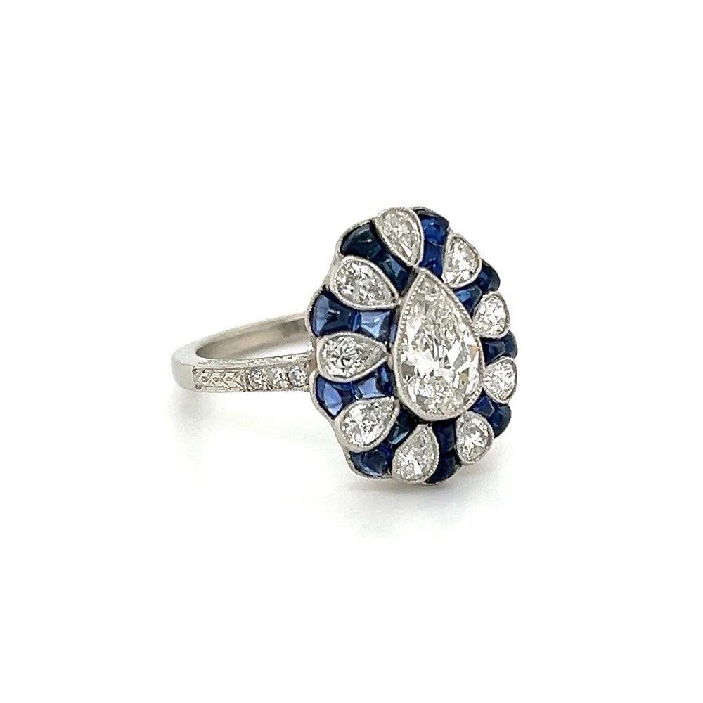 Simply Beautiful! Vintage Antique Pear Diamond, Sapphire, OEC & Pear Diamonds Platinum Cocktail Ring. Centering a securely nestled Hand set 0.87 Carat Antique Pear Diamond. Surrounded by 4.91tcw Sapphires and 1.00tcw OEC & Pear Diamonds. Hand