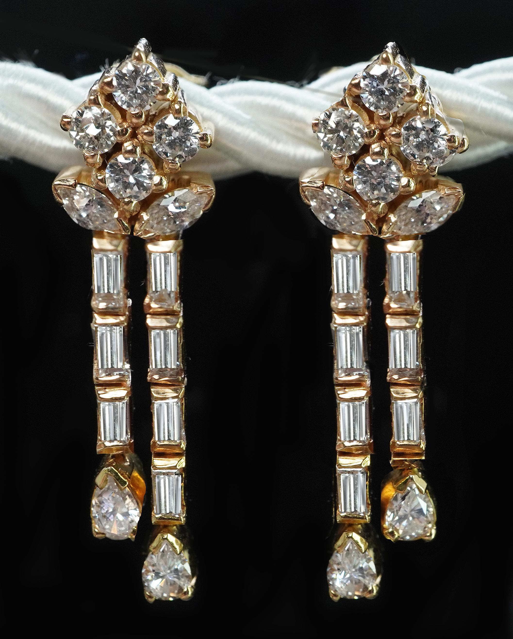 Vintage Pear Marquise Baguette Diamond Dangling Drop Earrings 18K Gold Estate 1.2ct 

These beautiful dangling earrings come from a fine estate. They are crafted in luxurious 18K yellow gold (acid tested and guaranteed). The posts are 14K yellow