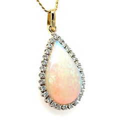 Vintage Pear Opal with Diamond Halo Pendant Necklace in 14K Yellow Gold.