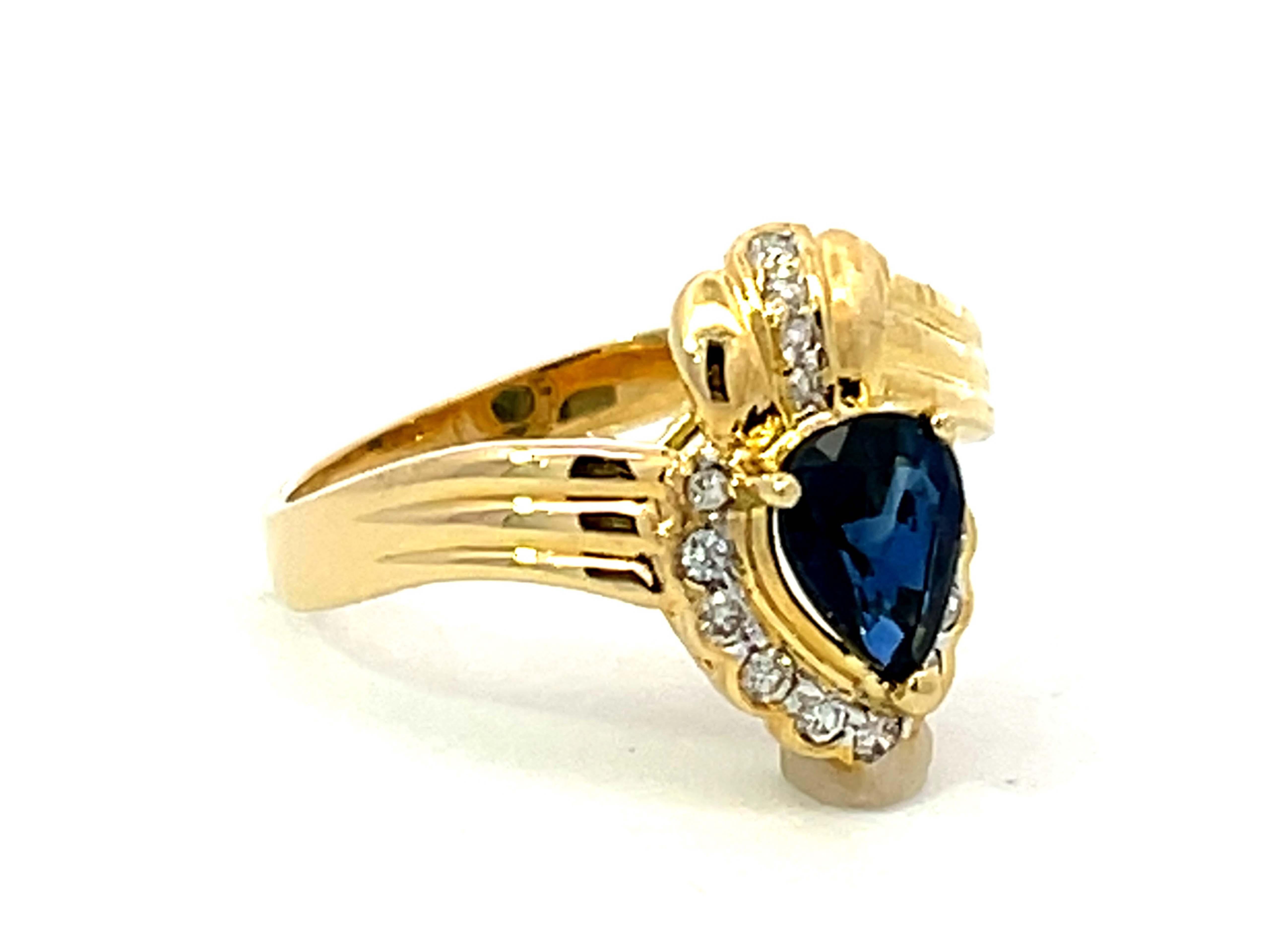 Pear Cut Vintage Pear Shaped Sapphire and Diamond Halo Ring in 18k Yellow Gold For Sale