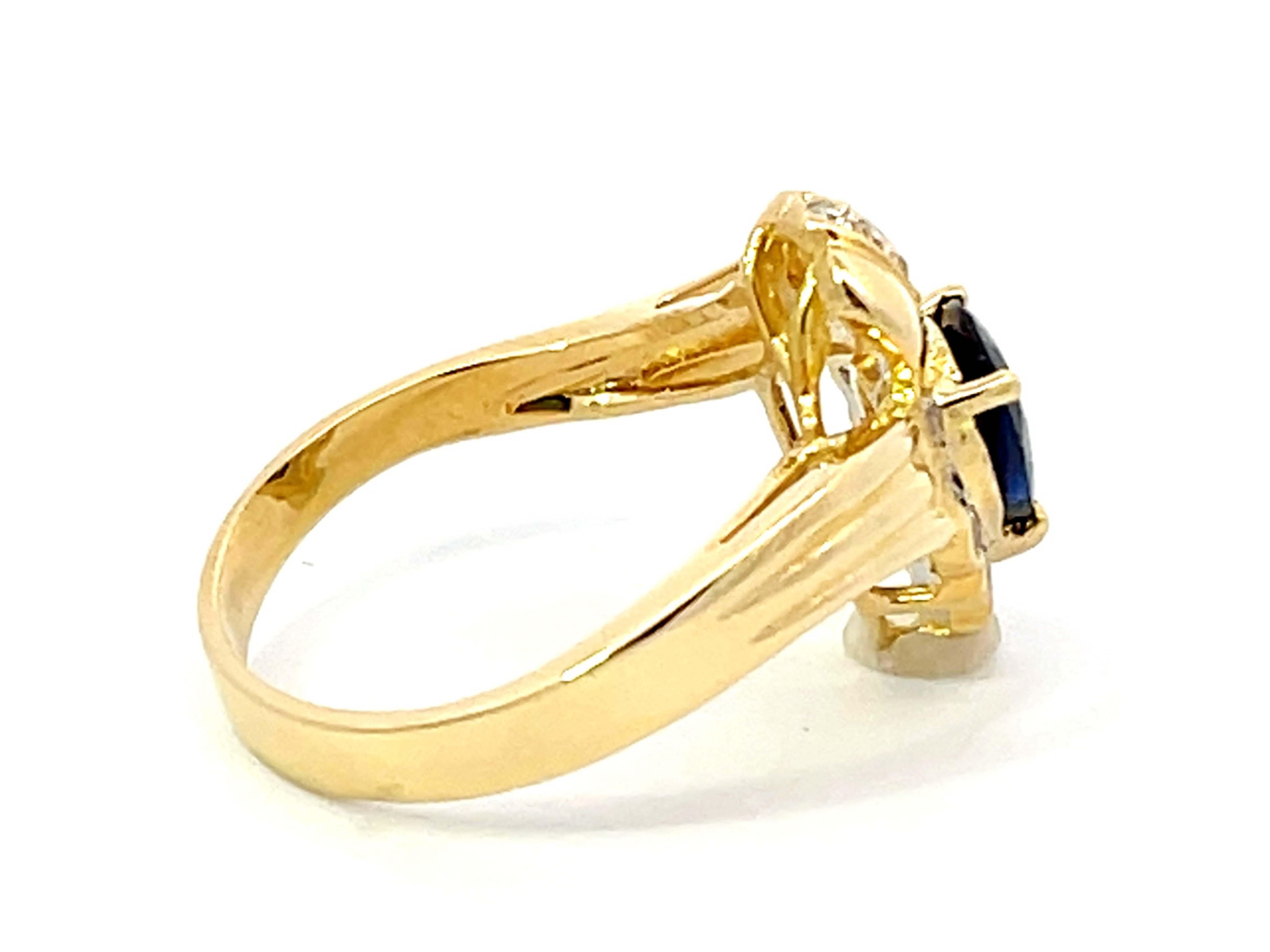 Women's Vintage Pear Shaped Sapphire and Diamond Halo Ring in 18k Yellow Gold For Sale