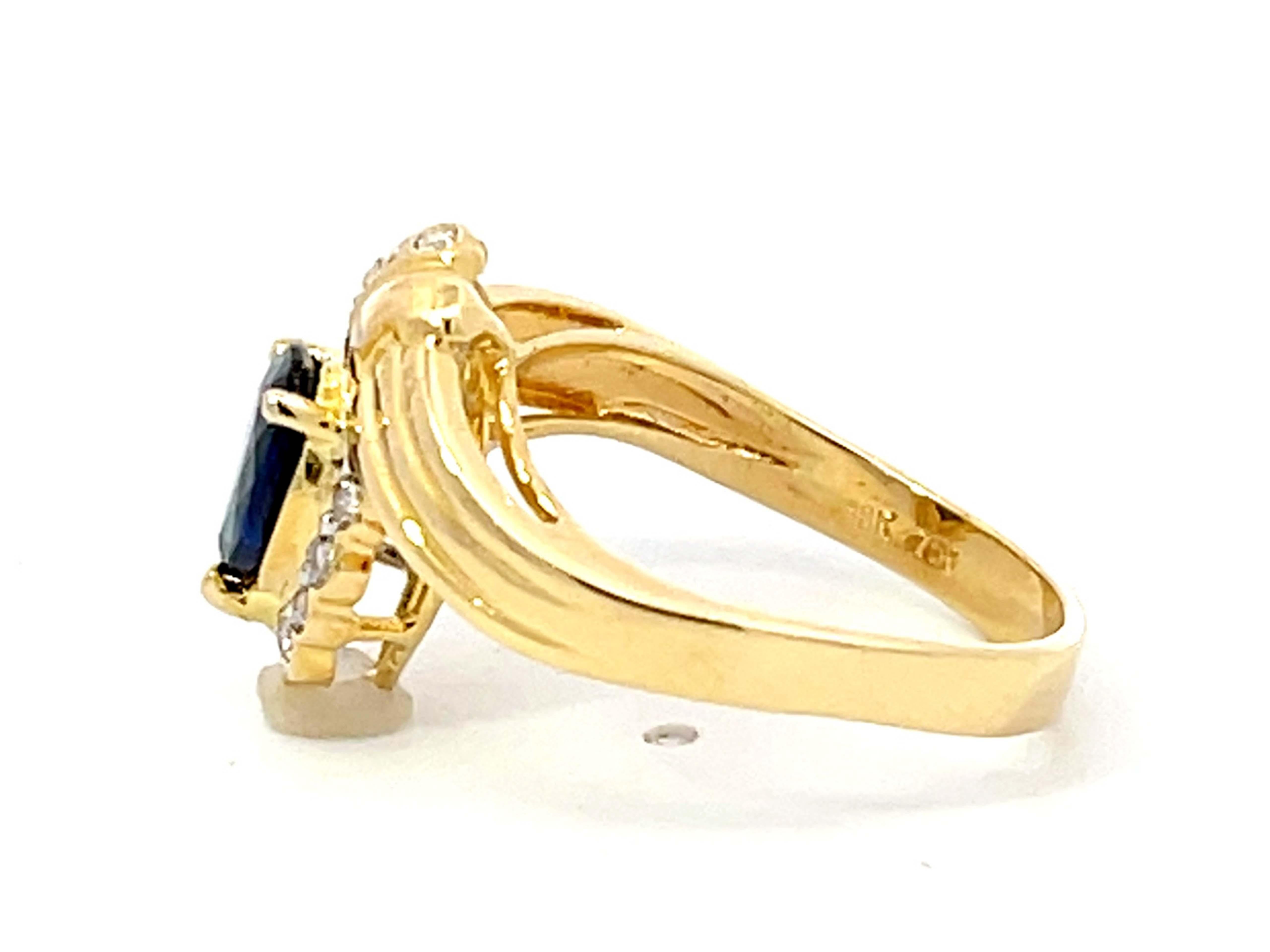 Vintage Pear Shaped Sapphire and Diamond Halo Ring in 18k Yellow Gold For Sale 1