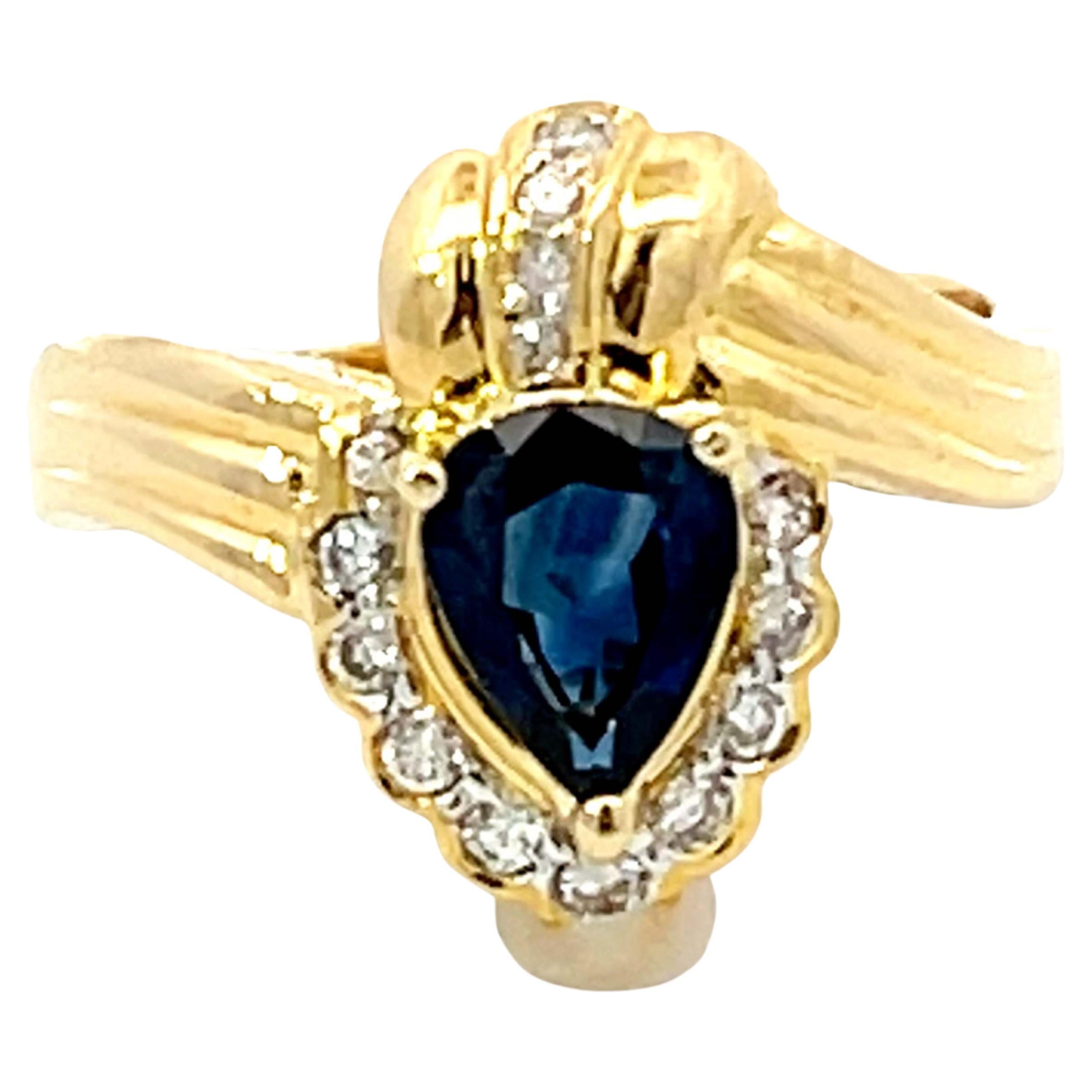 Vintage Pear Shaped Sapphire and Diamond Halo Ring in 18k Yellow Gold For Sale