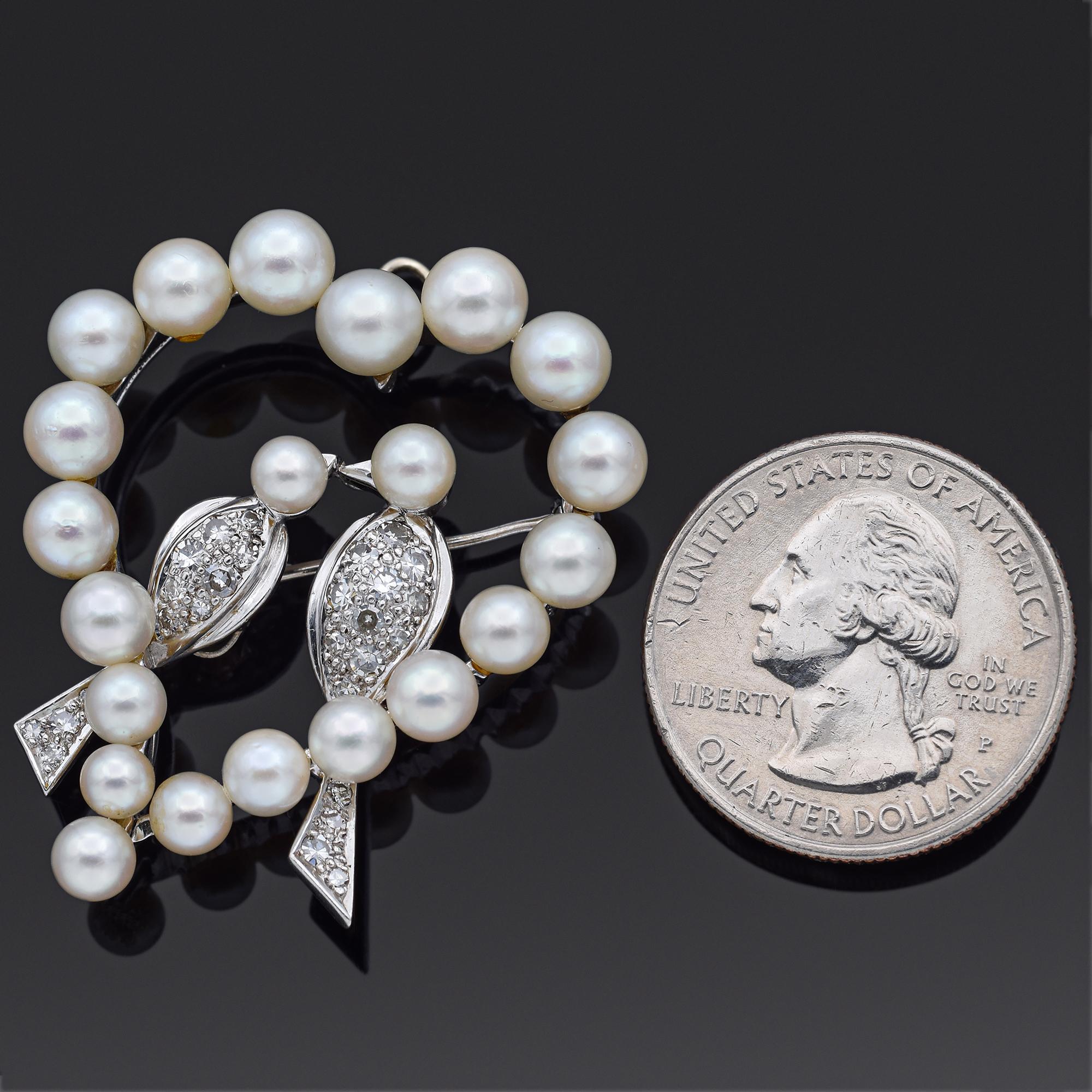 Weight:  12.4 Grams
Stone: Pearl (4-6 mm) & Approx 0.68 TCW (0.015-0.03 ct) Diamonds
Measurements: 40 x 35 mm
Hallmark: 14K Tested

ITEM #: BR-1077-101823-10