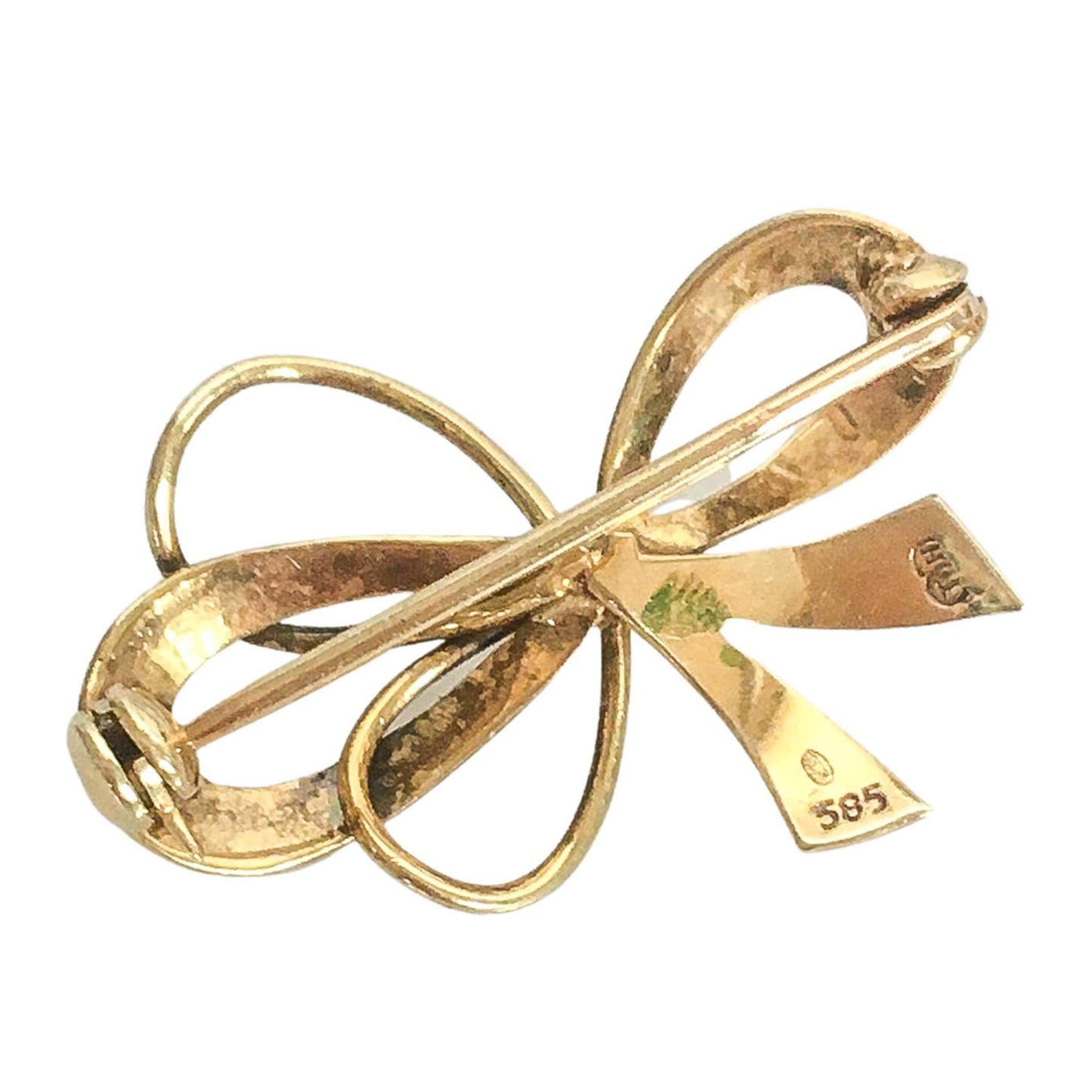 pearl bow brooch