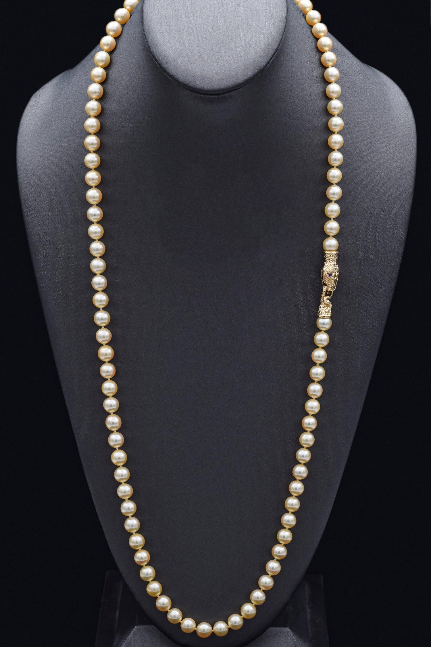 Weight: 79.1 Grams
Stone: Pearl (8-8.5 mm). Ruby (2 mm)
Length: 32 Inches
Hallmark: 14K

Item #: BR-1078-101823-13