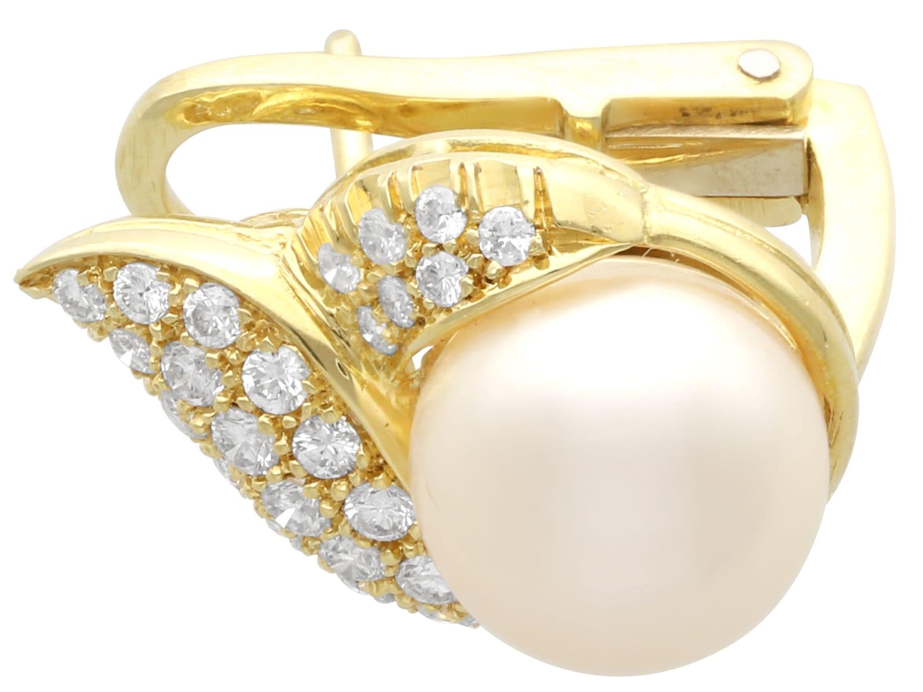 A stunning, fine and impressive pair of vintage pearl and 0.81carat diamond, 18 karat yellow gold cluster earrings - boxed; part of our diverse vintage pearl jewellery collections.

These stunning, fine and impressive vintage pearl earrings have