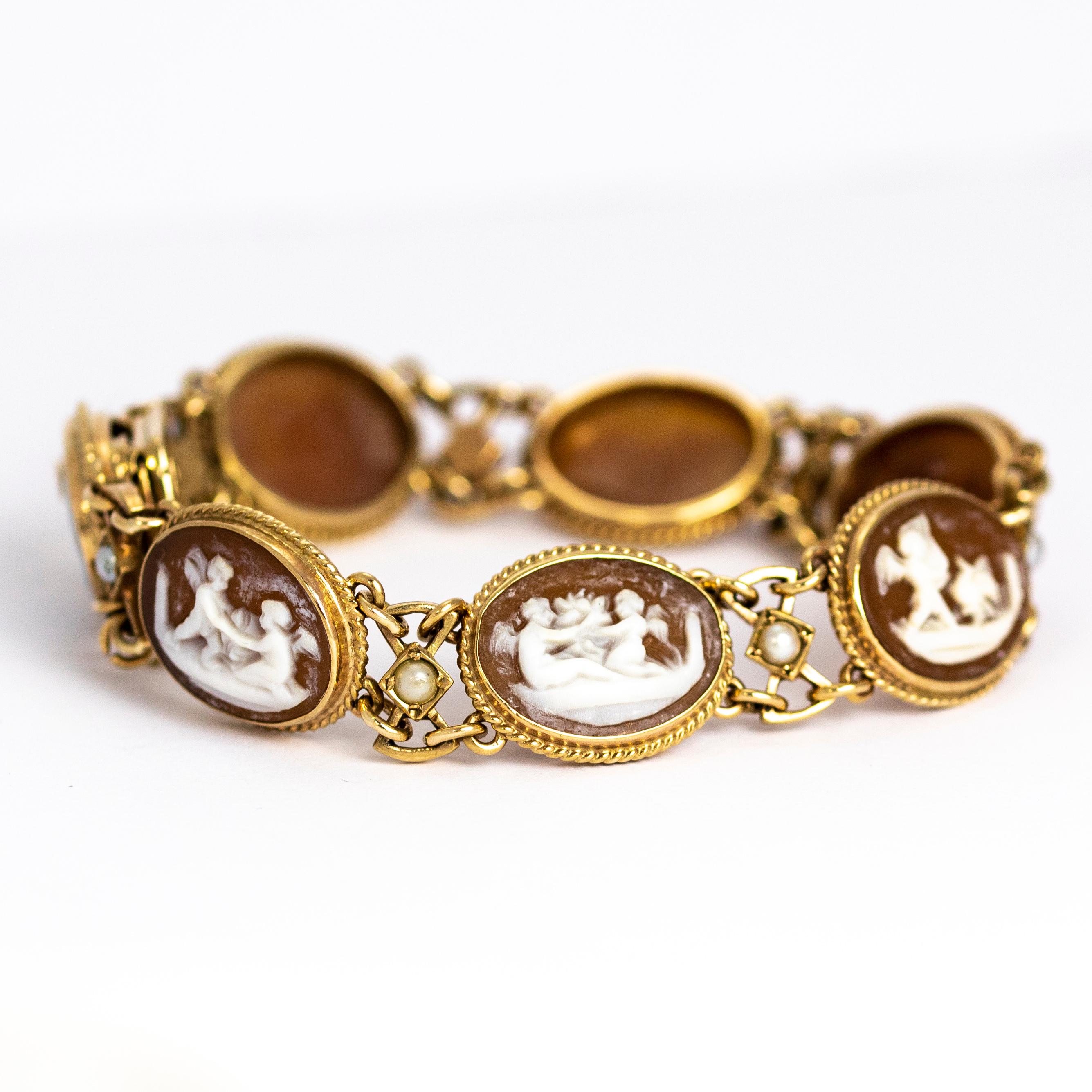 This sweet bracelet holds seven intricate scenes featuring cherubs and is beautifully carved out of shell. In between each scene a small pearl is held in a square setting on a decorative gold link. All modelled from 9ct gold and each link is