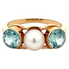 Anello d'oro a tre pietre con perle e zirconi blu vintage