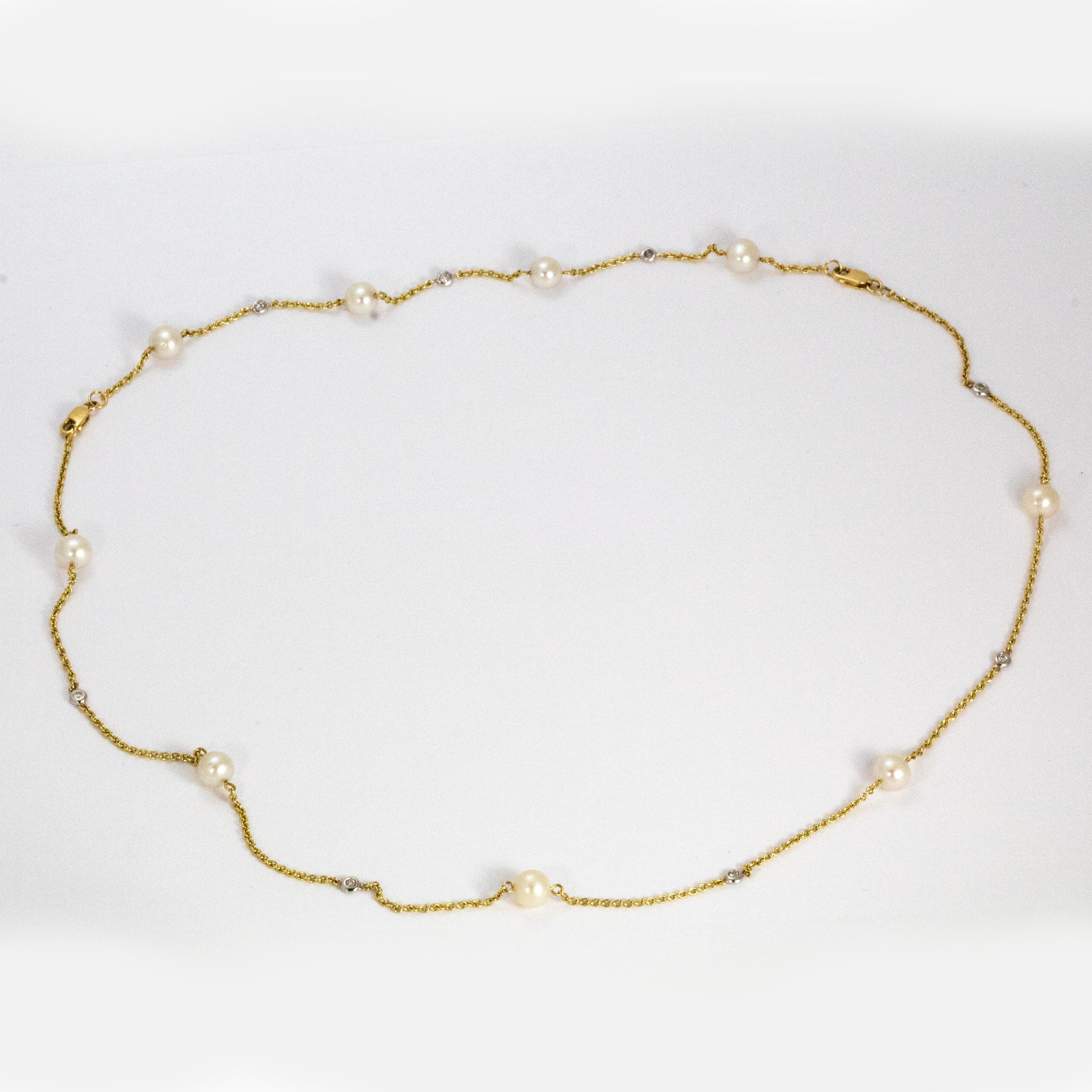 Delicate and unbelievably pretty, this 14ct gold necklace holds 9 pearls and  8 diamonds. As you can see from the images this necklace can be made into a bracelet also!

Necklace length: 16 1/2 inches
Bracelet length: 7 inches 
