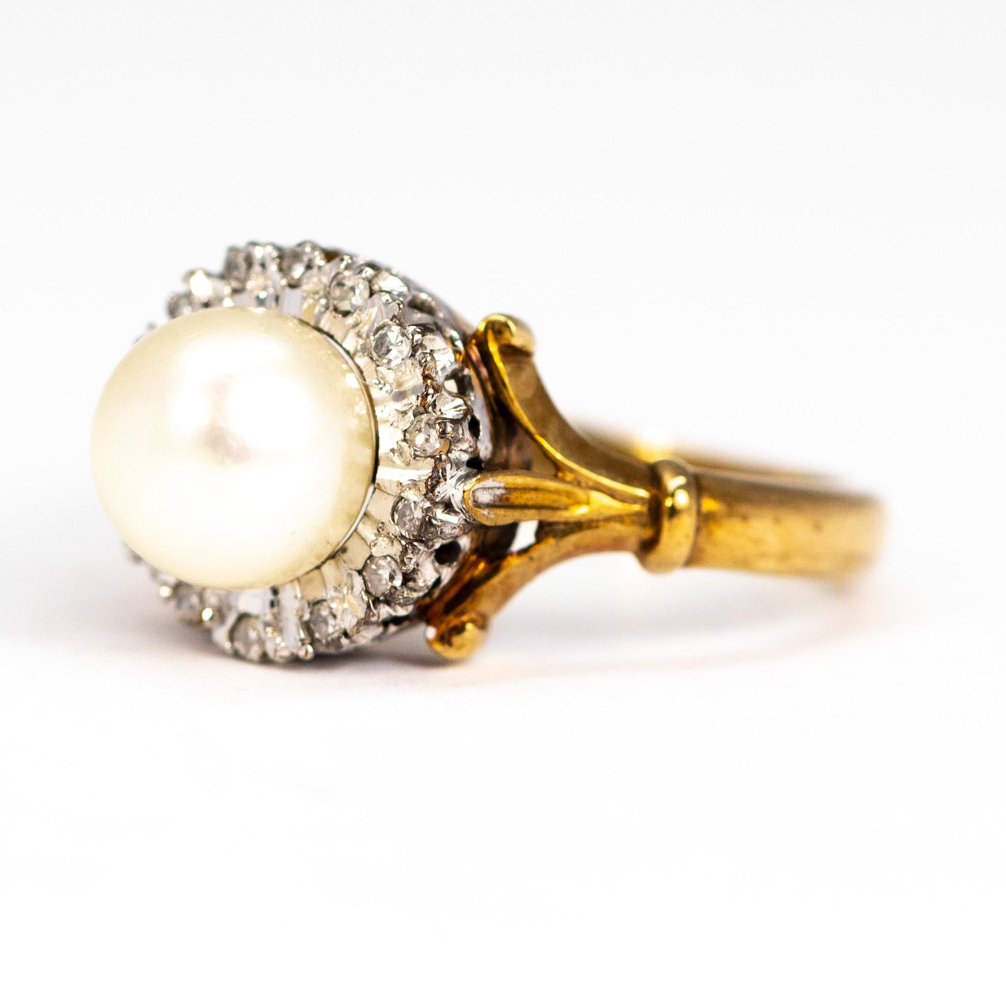 This pearl ring is simply stunning, the glossy sheen on this pearl is beautifully complimented by the shimmering halo of diamonds. The stones are set in platinum and the rest of the ring is modelled in 9ct gold. 

Ring Size: K or 5 1/4
Cluster