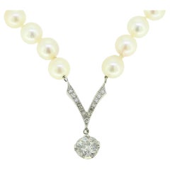 Collar vintage de perlas y diamantes