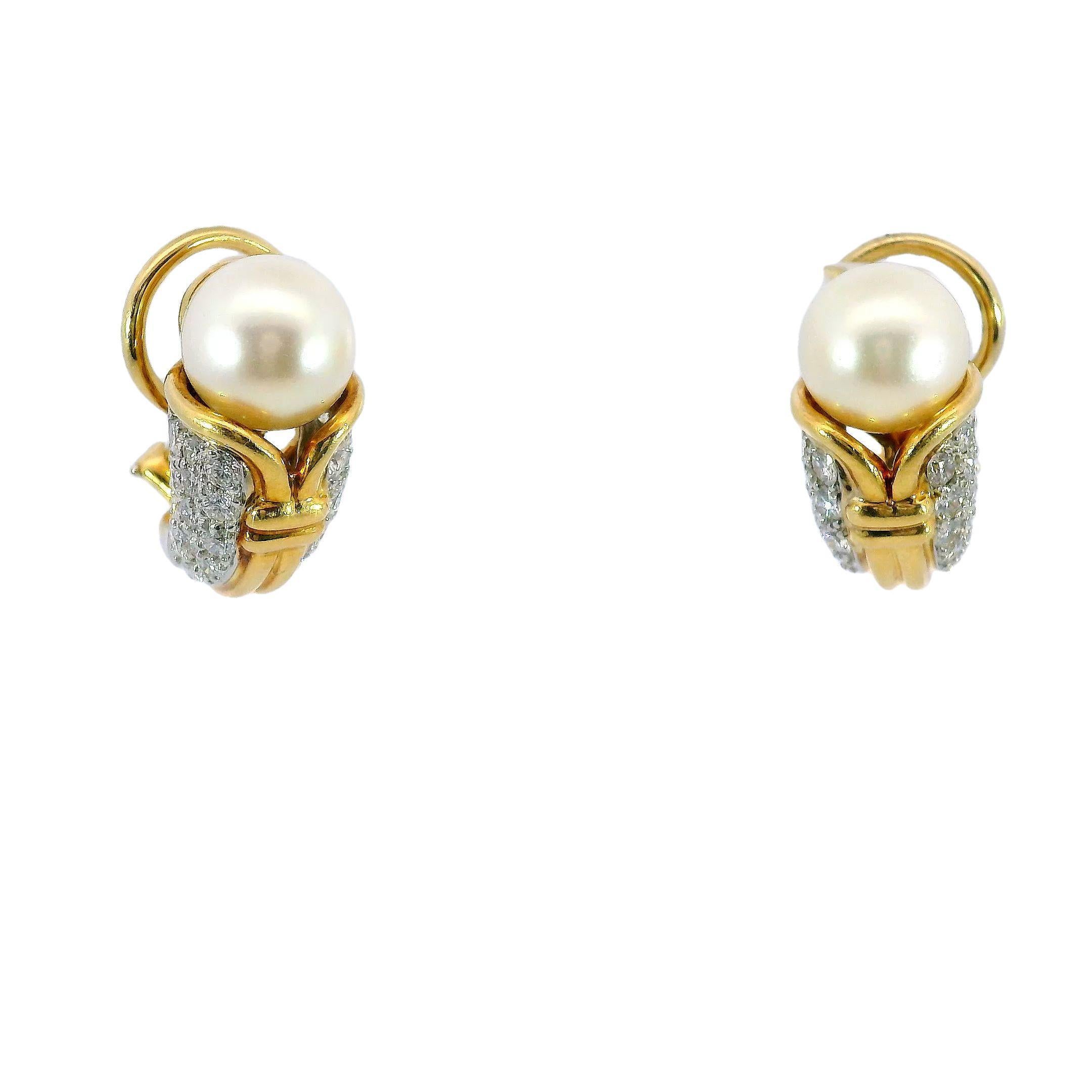 Vintage Tulip Clip on Earrings Pearl and Diamond Made in 18 Karat and Platinum  

These elegant contemporary earrings are a stunning example of timeless design and craftsmanship. Made from 18k yellow gold, the earrings feature lustrous white pearls