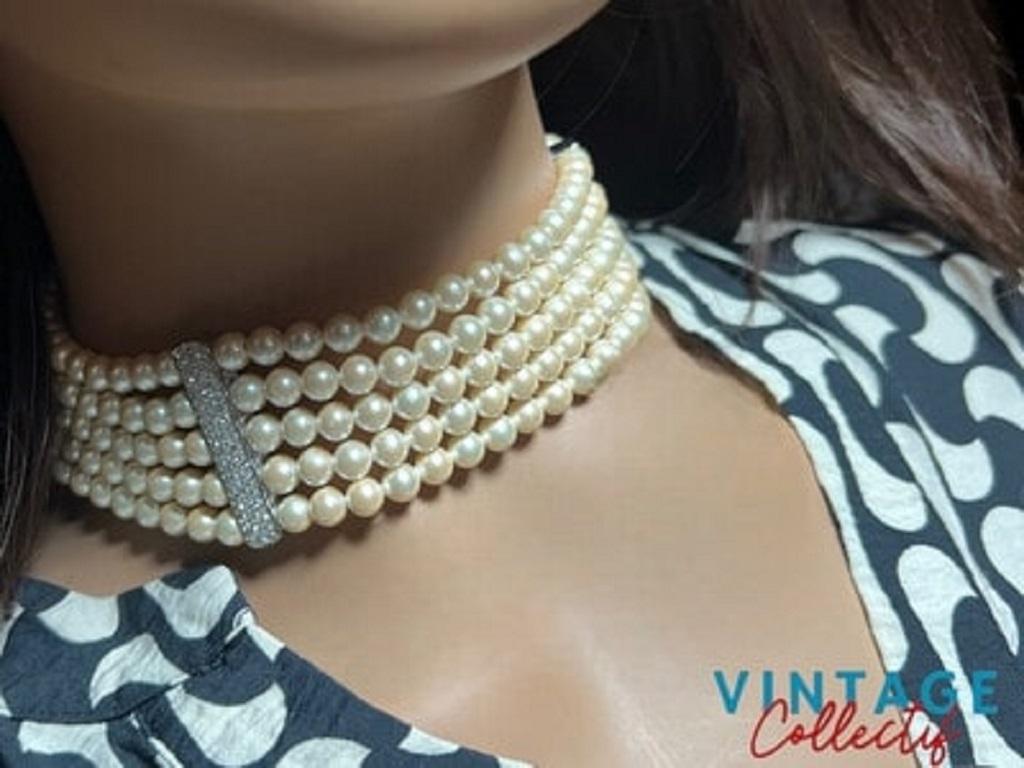 Vintage Christian Dior chocker necklace, never worn. 5 rows of faux pearls (glass beads), with 2 rods allowing the different rows to remain well aligned .35 cms plus extension


I am a partner with French experts group , recognized by the PayPal
