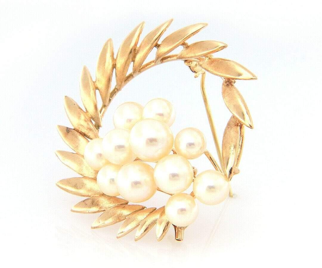 Vintage Pearl Cluster Brooch in 14K

Vintage Pearl Cluster Brooch
14K Yellow Gold
Pearl Sizes: Approx. 5.8 – 7.8 MM
Brooch Width: Approx. 40.0 MM
Weight: Approx. 11.20 Grams
Stamped: K14

Condition:
Offered for your consideration is a previously