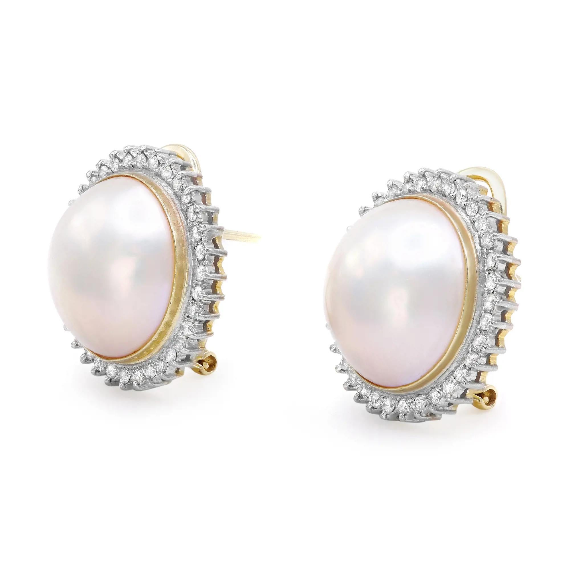 Vintage bold, beautiful pearl and diamond earrings. These earrings bring an elegant twist to a classic style that's great for any special occasion. Crafted in 14K yellow gold. Omega backs. Total weight: 14.80 grams. Total diamond weight: aprox.