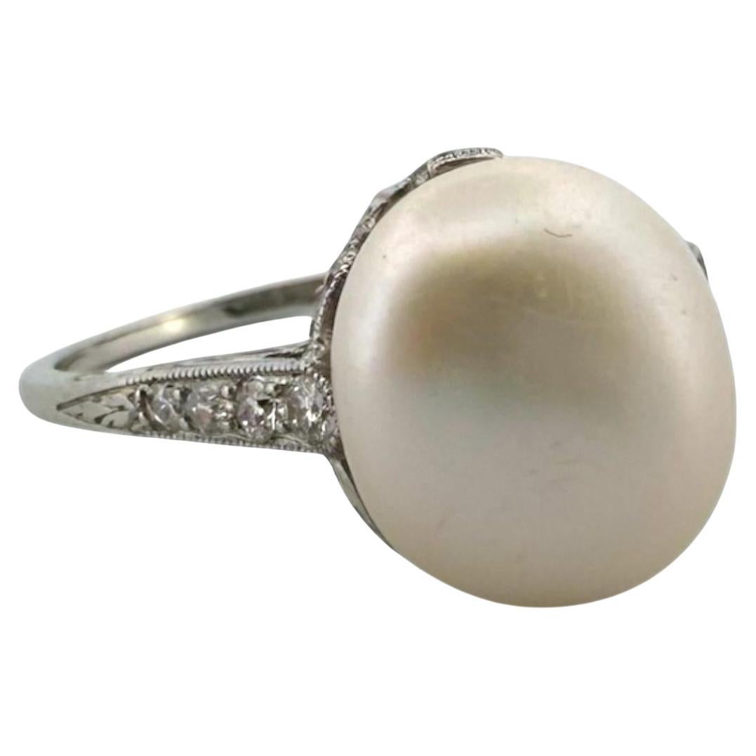 Vintage Pearl
Diamond Solitaire Platinum Ring GIA